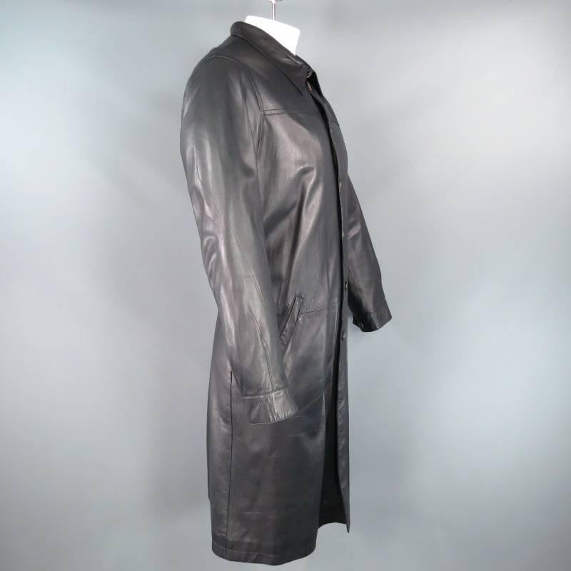 This classic winter coat by PRADA comes in a light weight, ultra soft smooth black leather and features a pointed collar, welt pockets, seven button closure, button closure sleeves, single vent back and is fully lined. A subtle upgrade from the