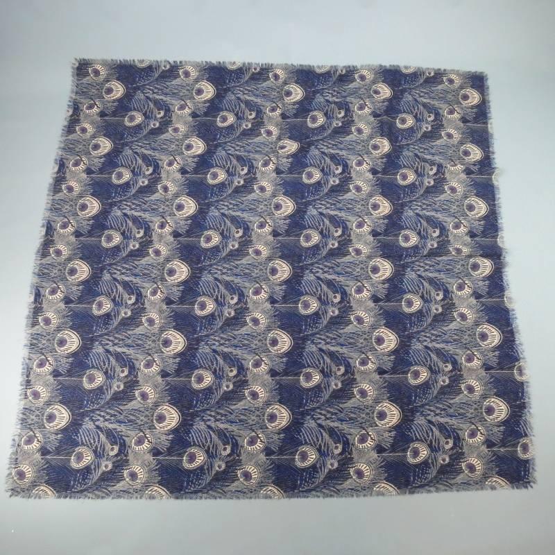 This large LIBERTY of LONDON shawl scarf comes in a raw edge wool printed in a gorgeous blue, gray, and violet peacock feather graphic. Made in England.
 
Excellent Pre-owned Condition.
 
55 X 53
