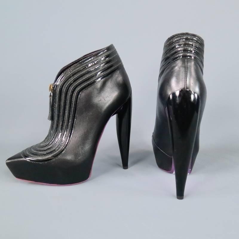 Fierce platform booties by MCQ ALEXANDER MCQUEEN. A fabulous style not for the faint of heart, these beauties feature a pointed toe with concealed platform, zip closure with stripes of patent leather piping, metallic lavender sole, and structural