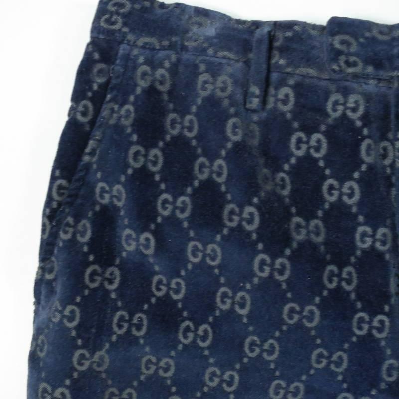 These iconic GICCI dress pants by TOM FORD come in a classic fit in a gorgeous navy blue velvet completely embossed with GG Gucci monogram print and have internal brace suspender buttons sewn in. Made in Italy.
 
Very Good Pre-Owned Condition.
