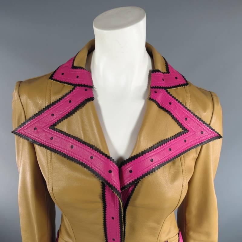 This fabulous vintage VALENTINO jacket comes in an ultra soft tan beige leather and features a cropped tailored blazer cut, wide pointed lapel, hidden placket snap closure, symmetrical flap pockets, single vent back, and gorgeous fuschia and black