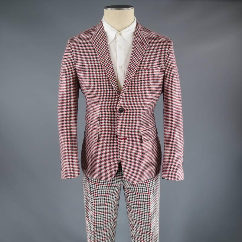 This set includes:

Black Fleece Sport Coat consists of wool material in a red, blue and white color tone. Designed in a houndstooth pattern, notch lapel collar, 3-button front with top pocket square seam and multiple flap pockets. Includes