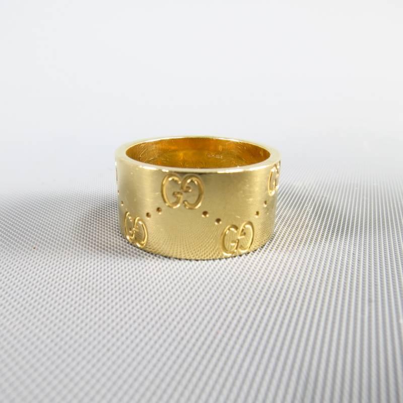 This chic GUCCI ring features a thick band of 18k Gold engraved with Gucci's signature monogram print. Made in Italy.
 
Very Good Pre-Owned Condition.
 
Ring Size: 5     Retail: 1500

Item ID: 72491