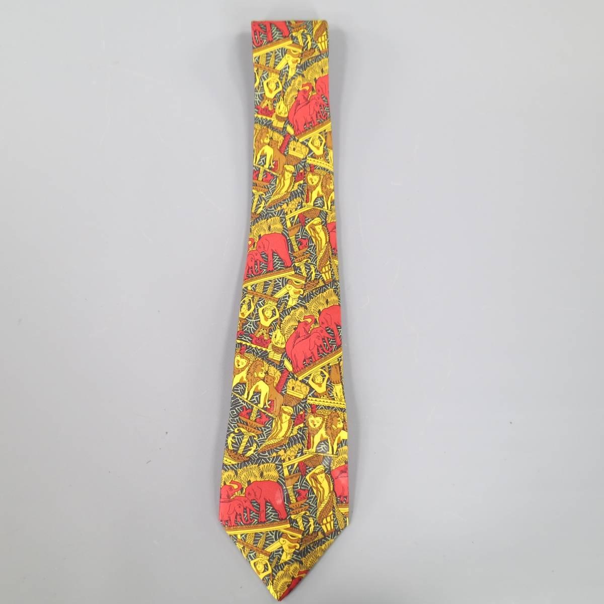 1 - Hermes Paisley Fish Tie: Beautifully detailed and printed silk material in a neon green and orange color tone. Designed with an abstract fish print throughout tie, shapes and floral pattern.
Made in France.
 
Excellent Pre-Owned