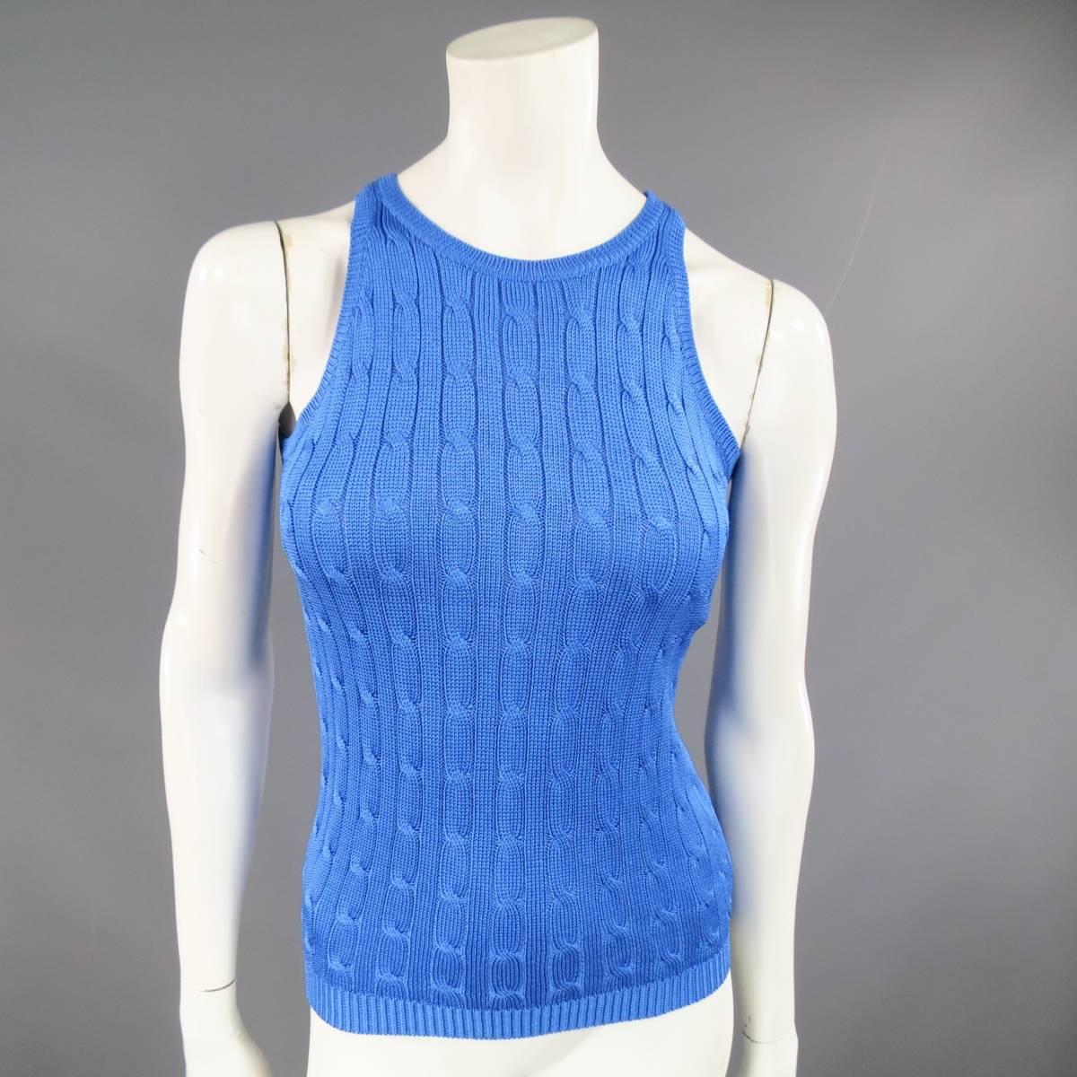 This RALPH LAUREN BLACK LABEL sweater set comes in shiny metallic blue silk cable knit and includes a cardigan and matching sleeveless top.

Excellent Pre-Owned Condition.
Marked: S

Measurements:

-Top-
Shoulder:  10 in.
Bust: 32