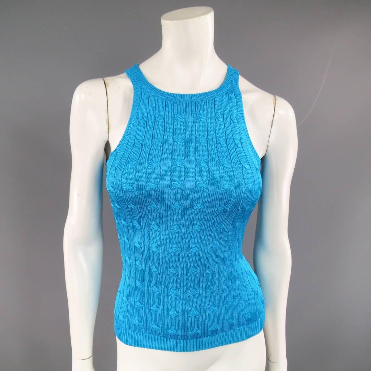 This RALPH LAUREN BLACK LABEL sweater set comes in shiny metallic turquoise blue silk cable knit and includes a cardigan and matching sleeveless top.

Excellent Pre-Owned Condition.
Marked: S

Measurements:

-Top-
Shoulder:  10 in.
Bust: 32
