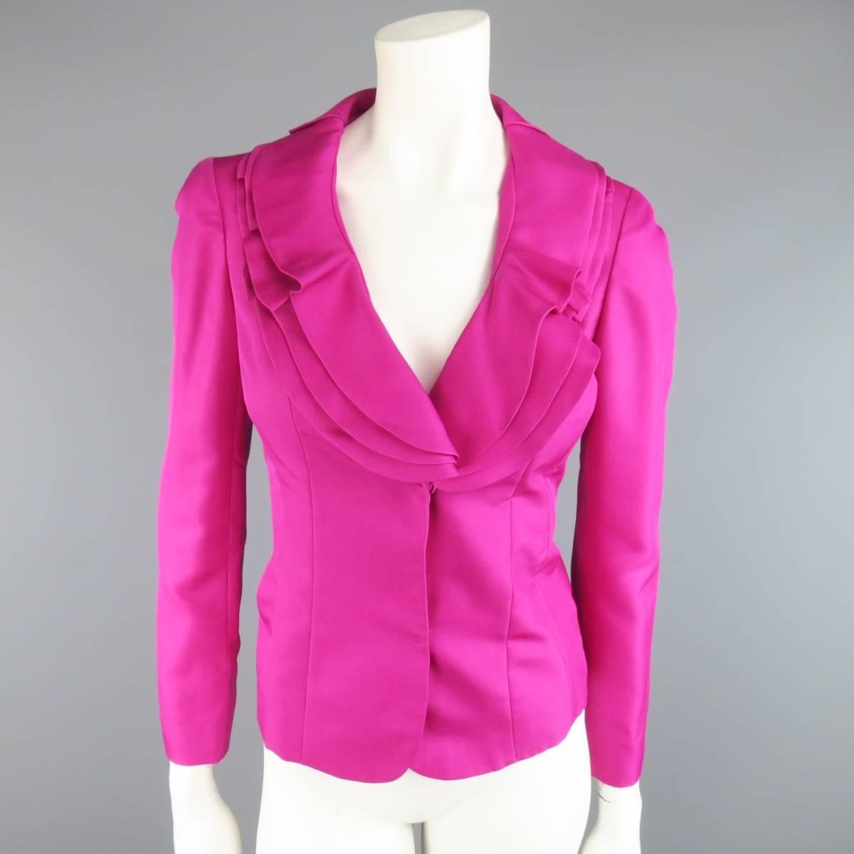 This lovely VALENTINO suit comes in a bold fuchsia pink textured silk taffeta and includes a jacket with hidden two snap closure and layered ruffle collar and matching pencil skirt. Made in Italy.
 
New with Tags.
Marked: 4
 
Measurements:

-Jacket: