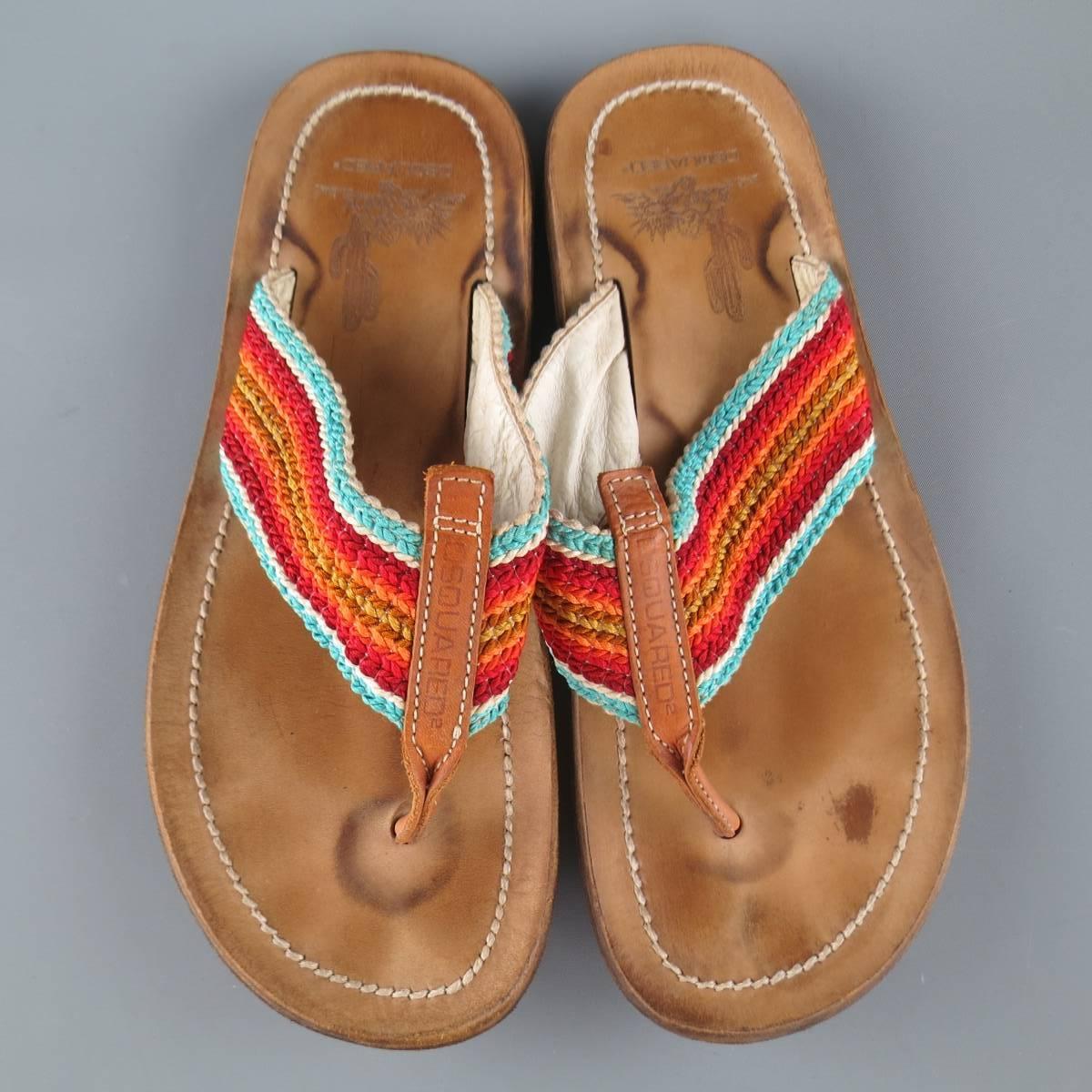 DSQUARED2 thong sandals come in tan leather and feature a logo embossed front with multi-color woven straps. Wear throughout As-Is. Made in Italy.
 
Fair Pre-Owned Condition.
Marked: (no size)


Web ID: 75794 