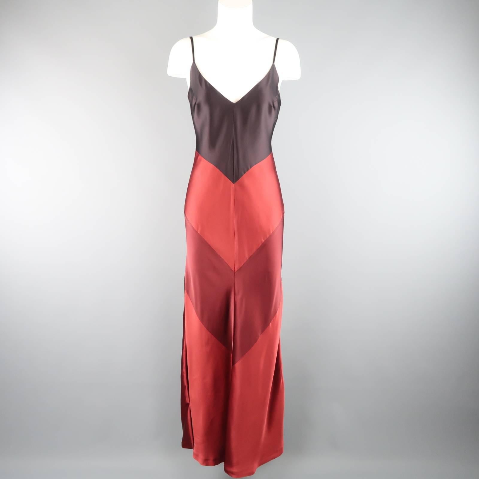 MAX MARA evening maxi dress comes in plum purple and red color block satin and features a V neckline and patchwork construction. Includes matching sash. Made in Italy.
 
Excellent Pre-Owned Condition.
Marked: IT 40
 
Measurements:
 
Bust: 36