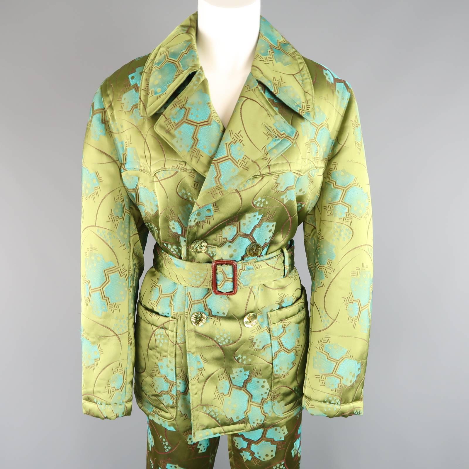 JEAN PAUL GAULTIER Femme ensemble comes in an abstract chinoiserie print silk blend satin and includes  a double breasted cropped trench style jacket with abolone buttons and matching wide leg flair trousers both with signature back tab detail. Made