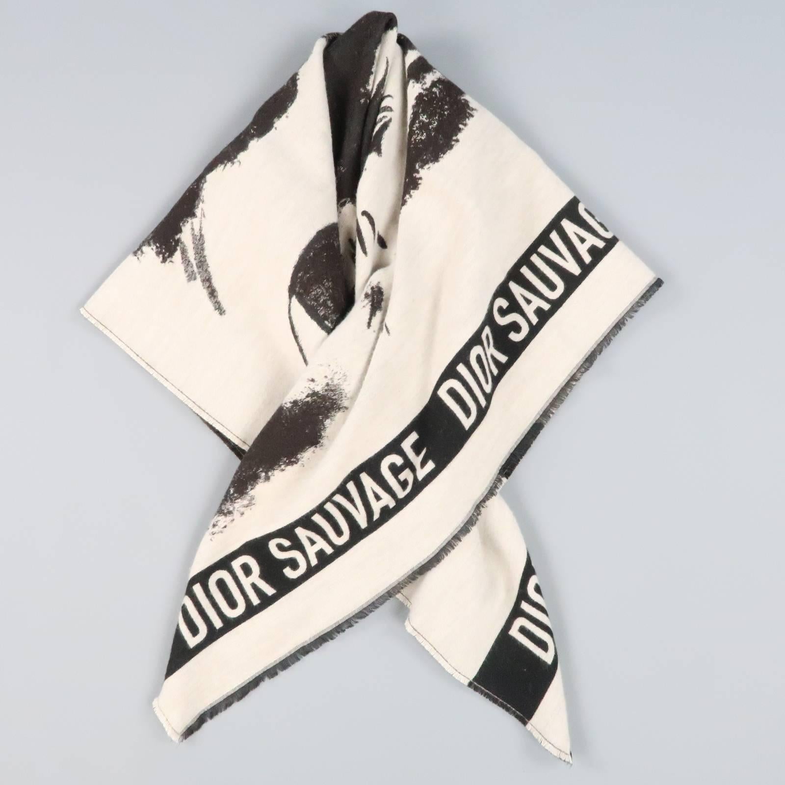 DIOR blanket scarf comes in an acrylic/wool/silk blend knit featuring an all over animal motif with 