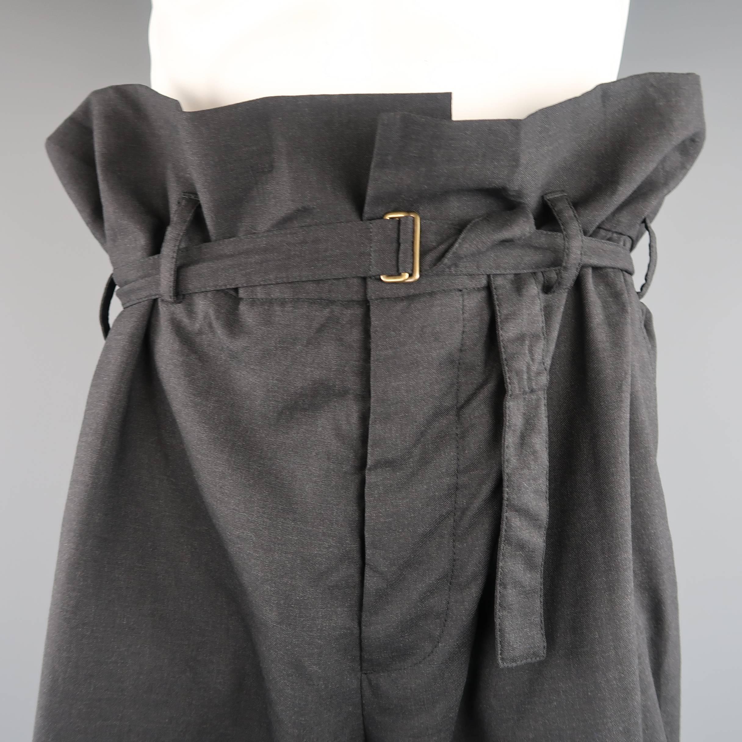 MARNI drop crotch shorts comes in a light weight charcoal wool fabric and feature an oversized silhouette with extended waistband that gathers and ruffles when belted. Made in Italy.
 
Excellent Pre-Owned Condition.
Marked: IT 50
 
Measurements:
