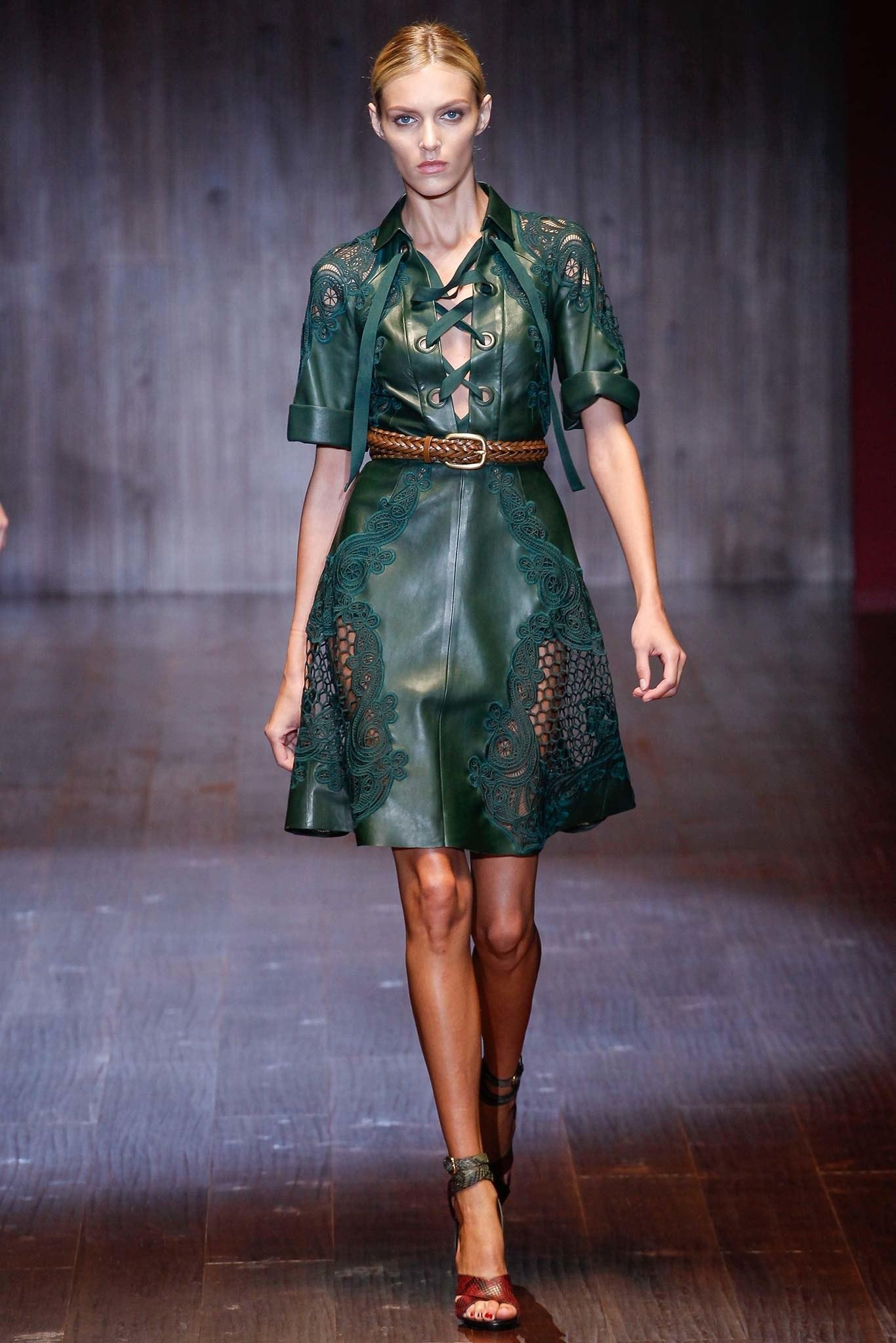 Gucci Spring 2015 dress comes in supple green leather with a pointed collar, ribbon lace up V neck front with covered grommets, short, cuffed sleeves, and broderie anglaise lace cutouts panels. Made in Italy. Retailed at $8400.00

V. Good Pre-Owned