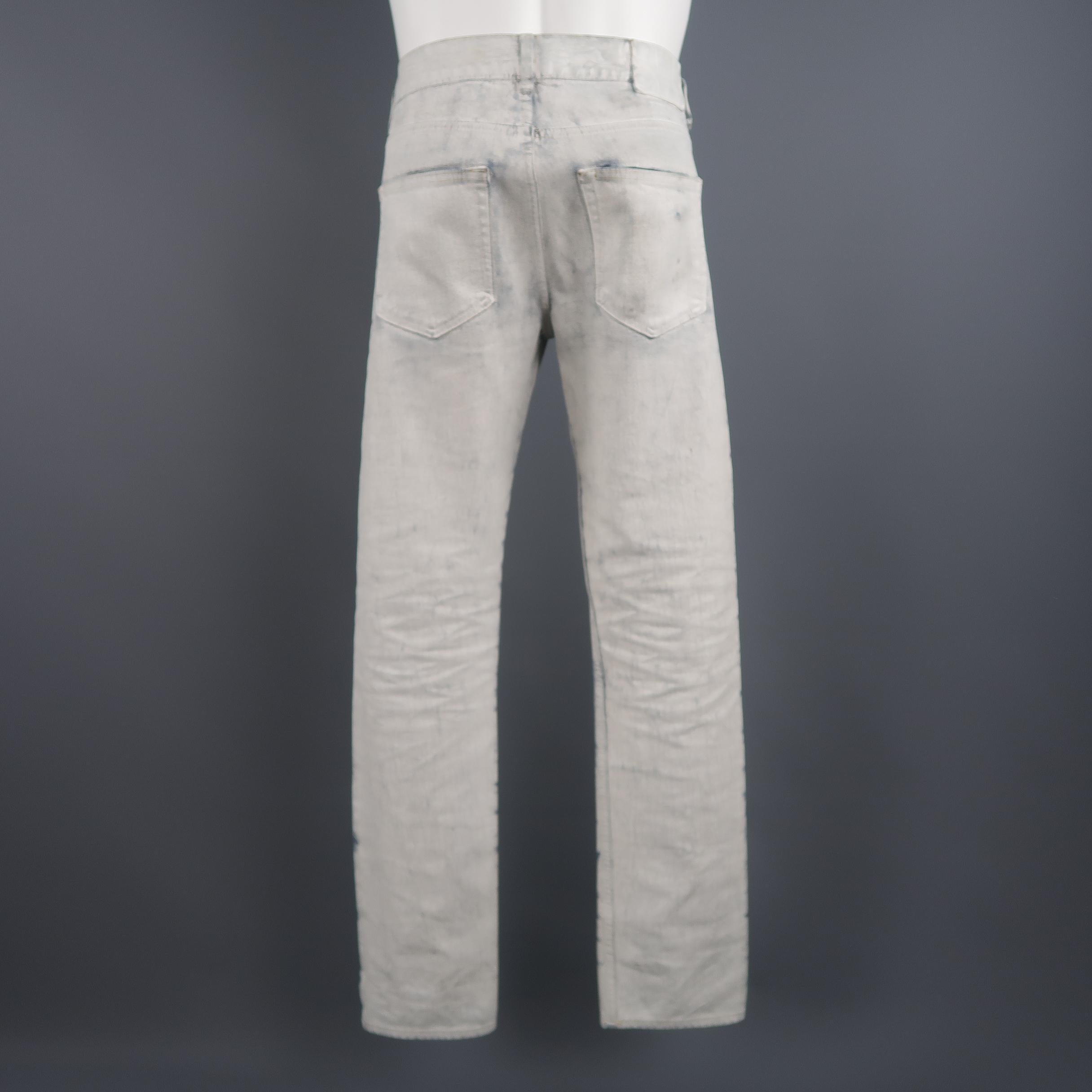 Maison Martin Margiela  X H&M Size 30 come in white painted distressed jeans  with fly button closure.
 
Good Pre-Owned Condition.
Marked: US 30
 
Measurements:
 
Waist: 34 in.
Rise: 10 in.
Inseam: 32 in.