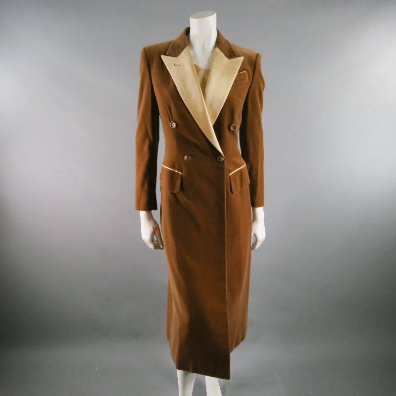 Reminiscent of a 30's 40's design, this 2 pc dress stuns.  RICHARD TYLER COUTURE makes a below the knee jacket/dress in a ultra soft brown velvet.  Double breasted closure at waist with flaps.  Large, peak lapels in champagne toned silk. Single