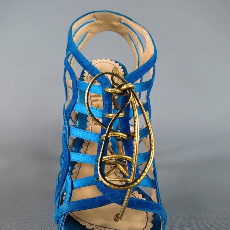 Fabulous open toe platform sandals by John Galliano. A sexy style in gorgeous aqua teal silk and suede these caged ankle booties feature artsy interlocking straps, gold leather laces, and covered platform and stiletto heel. With Box. Made in Italy.
