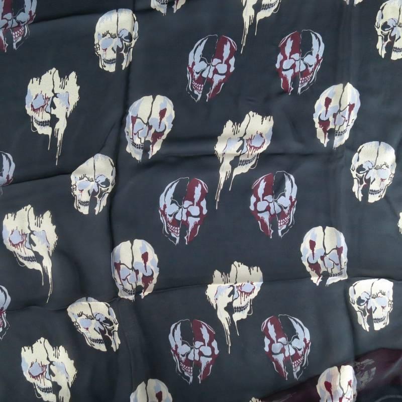Fabulous silk chiffon scarf by ALEXANDER MCQUEEN. This unique and rare style comes in a black backdrop with spooky melting skull graphic print throughout and a burgundy skull boarder. Made in Italy.
 
Excellent Pre-Owned Condition.
 
40 X 40 in.