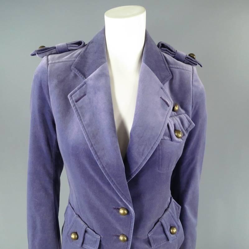 Fabulous cropped military jacket by YVES SAINT LAURENT. A rare piece from the TOM FORD archives, this piece comes in a beautiful violet lavender velvet and features a notch lapel, bow epaulets, symmetrical hip flap pockets with tarnished gold tone