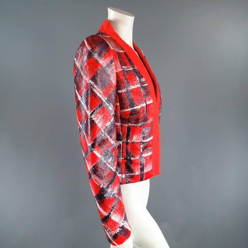 Fabulous statement jacket by ESCADA. An ultra chic collarless style comes in red tweed and features a band lapel, triple hook and eye closure , strong shoulder, and beautiful glossy red, white, and navy abstract pattern paint coated base. A true