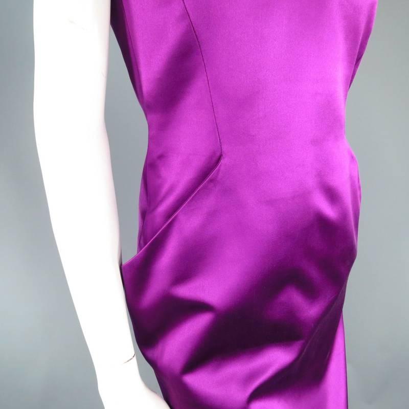 Gorgeous structured cocktail dress by ALEXANDER MCQUEEN. A sexy sleeveless style in magenta purple silk satin featuring a high straight neckline with V slit, side slit pockets that stick out a little for an exaggerated silhouette, and a deep V back
