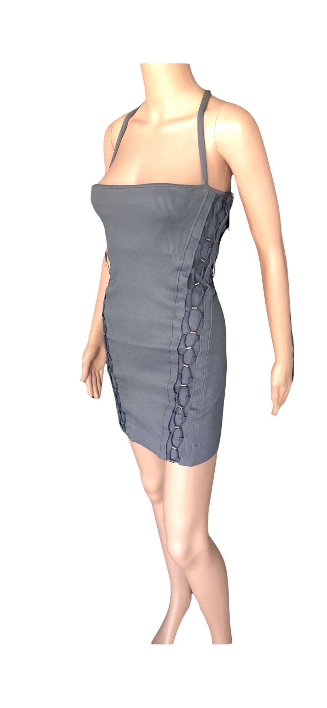 Gucci S/S 2010 Bodycon Lace Up Bandage Grey Mini Dress

Please note the size and fabric tags have been removed. This item will best fit size XS/S.
