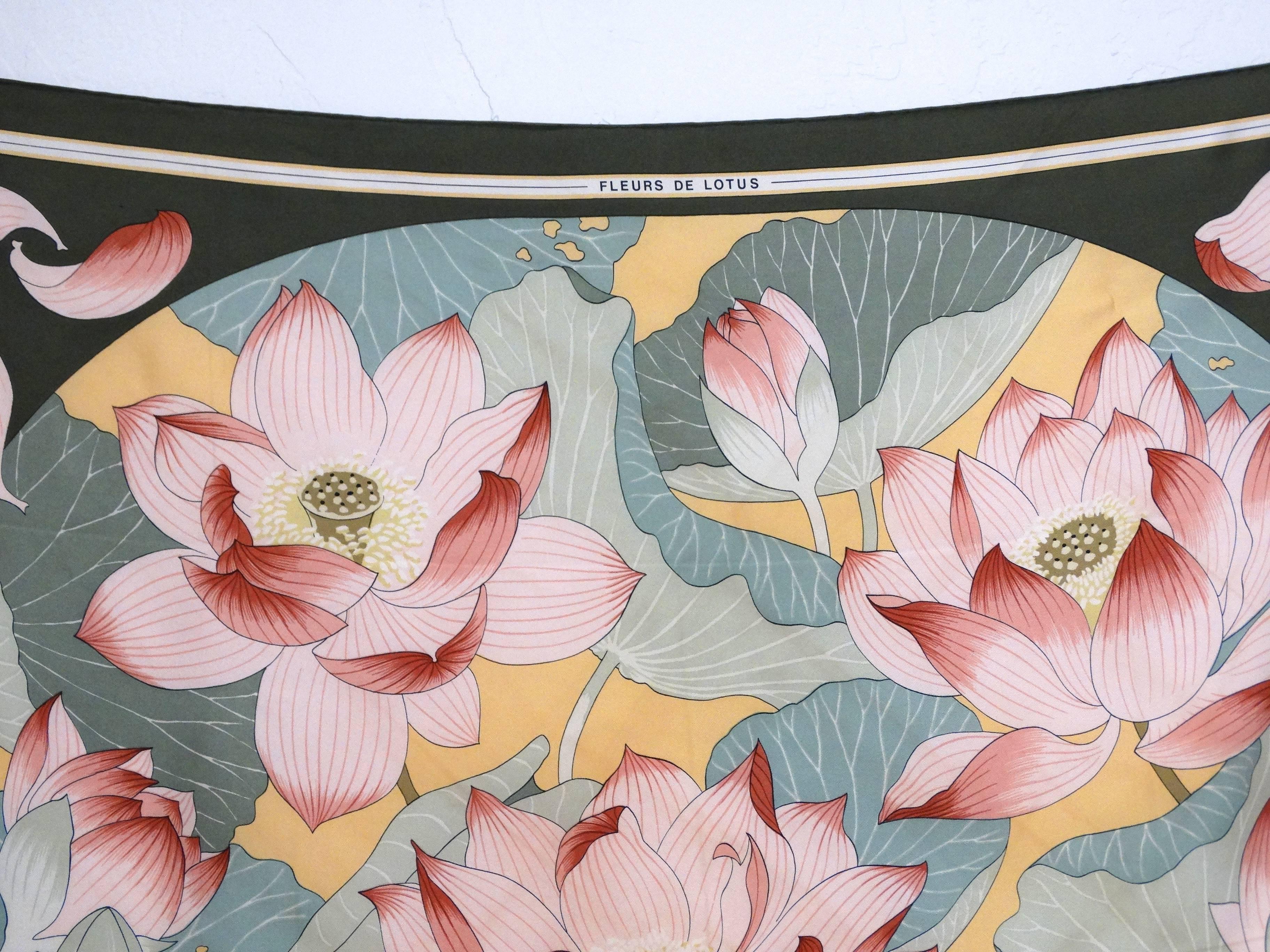 First designed in 1976, this beautiful silk Fleurs de Lotus created by Christiane Vauzelles for Hermes in the early 80's is divine. It depicts beautiful Lotus flowers, in variations of green, pink and white colors. The scarf is 100%