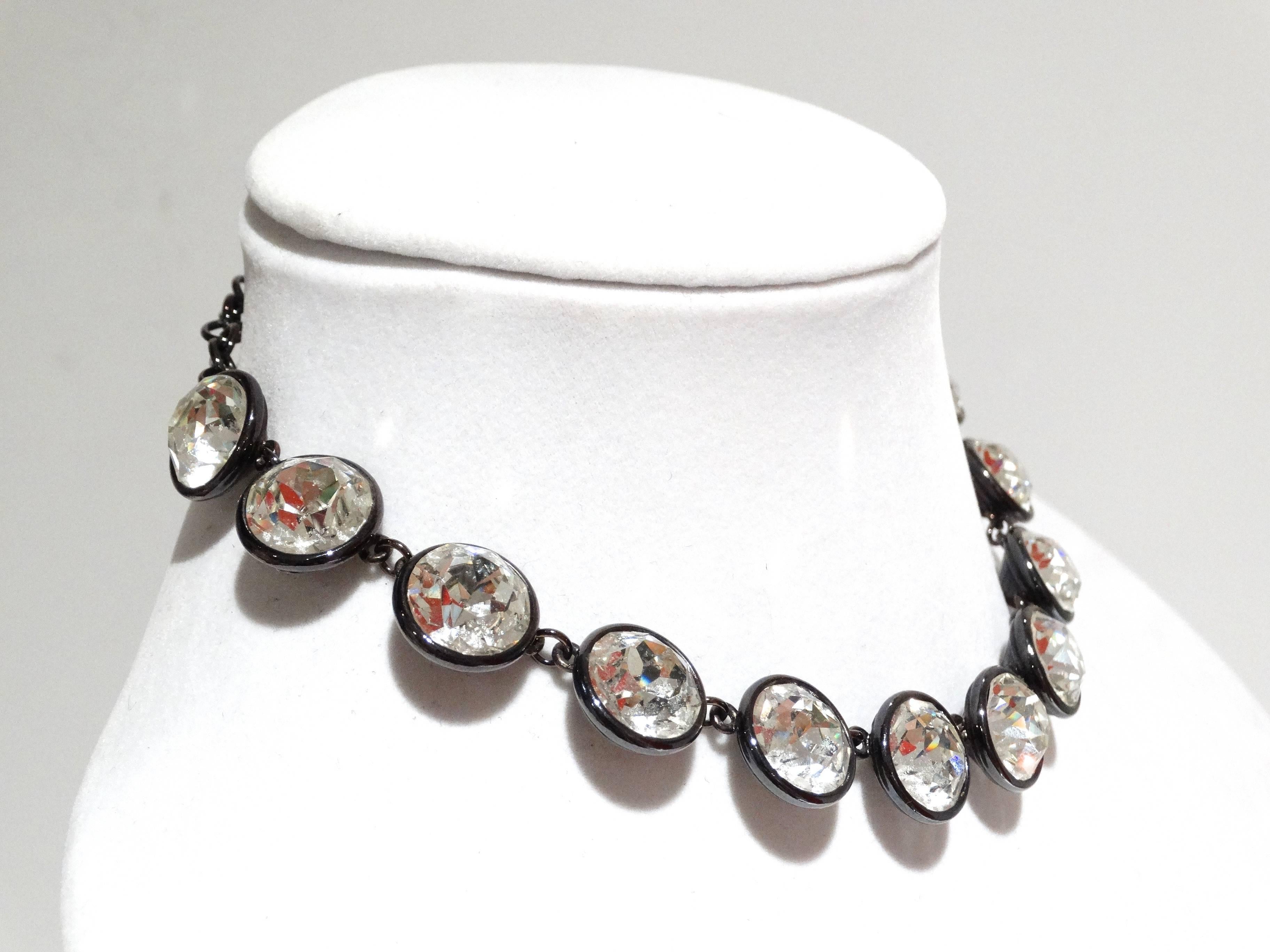 This is a beautiful YSL piece made of 15 large faceted crystals in a gunmetal-gray chain. The necklace is a 