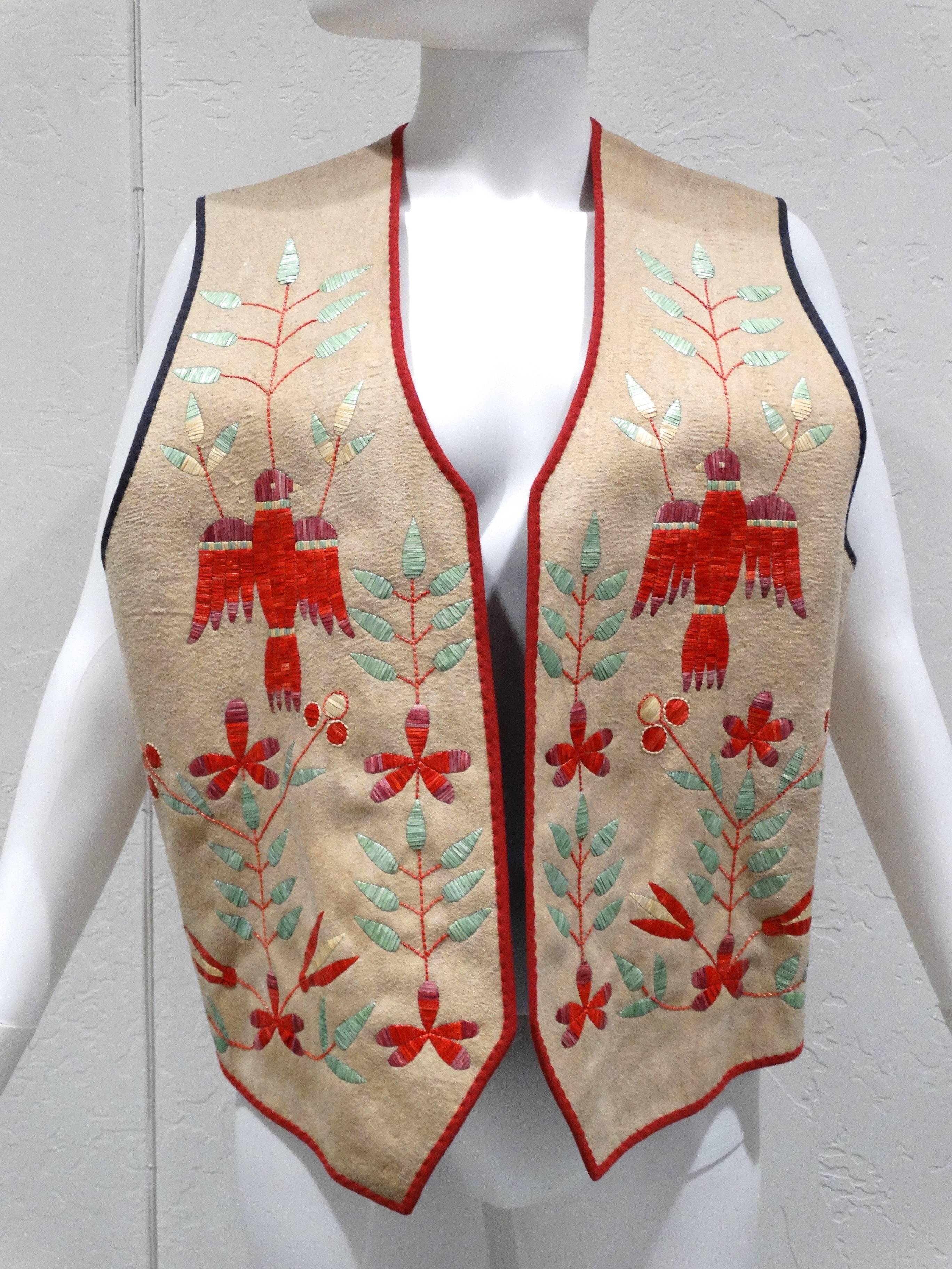 Rare 1940's Quillwork Vest is in beautiful natural buckskin, vest features stunning quillwork embroidery! The motif of florals and birds are stunning, hand dyed in the perfect pantone palette for spring. The vest's inside is quilted cotton and the