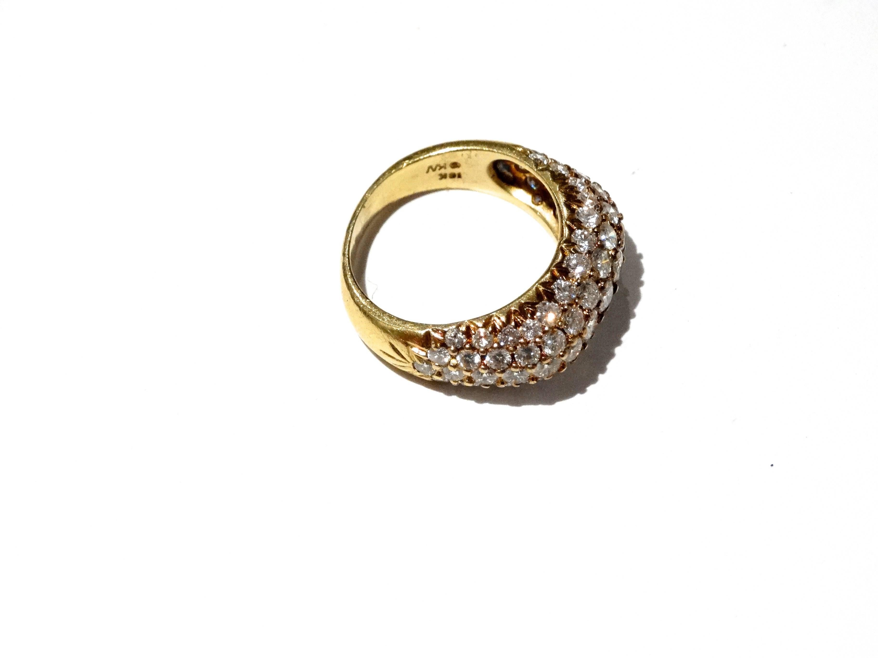Beautiful ladies diamond dome ring designed by Kurt Wayne, this beautiful diamond ring is 14kt yellow gold diamond cluster dome ring contains five rows of sixty-nine (69) total brilliant cut diamonds, all pave set, varying in size fron approximately