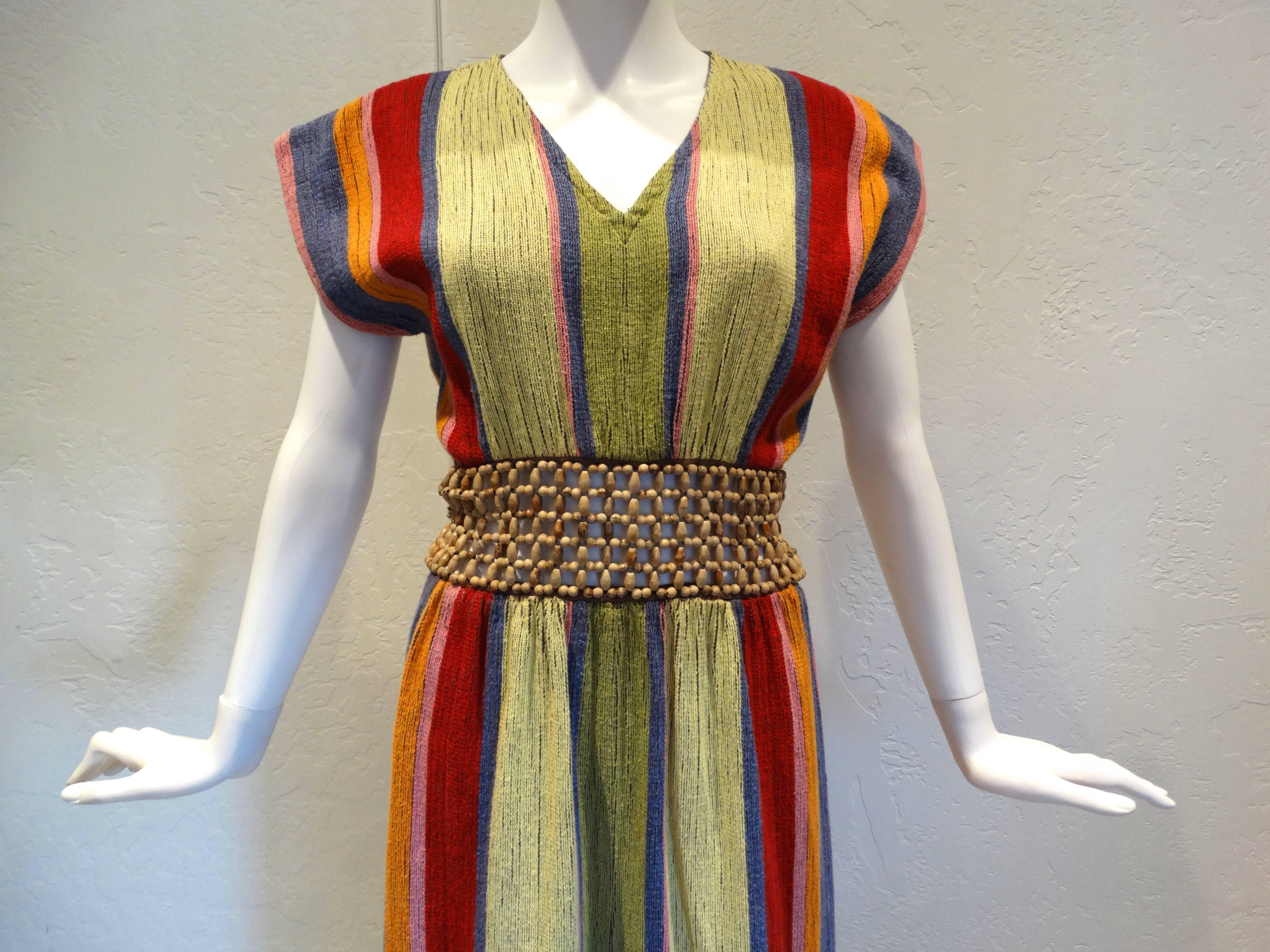 Rare 1970's Multi colored, short sleeved, V-neck, almost full length 100% cotton woven dress by Rikma, Made in Israel for Feline's of Boston. Main colors are green, yellow, red and blue, and is 