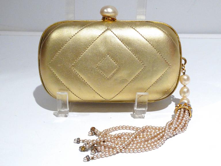 Preowned 1980s Gold Chanel Clutch With Pearl Tassel ($2,800) ❤ liked on  Polyvore featuring bags, handbags, clutche…