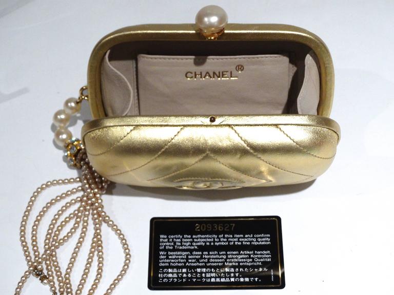 1980s Gold Chanel Clutch with Pearl Tassel