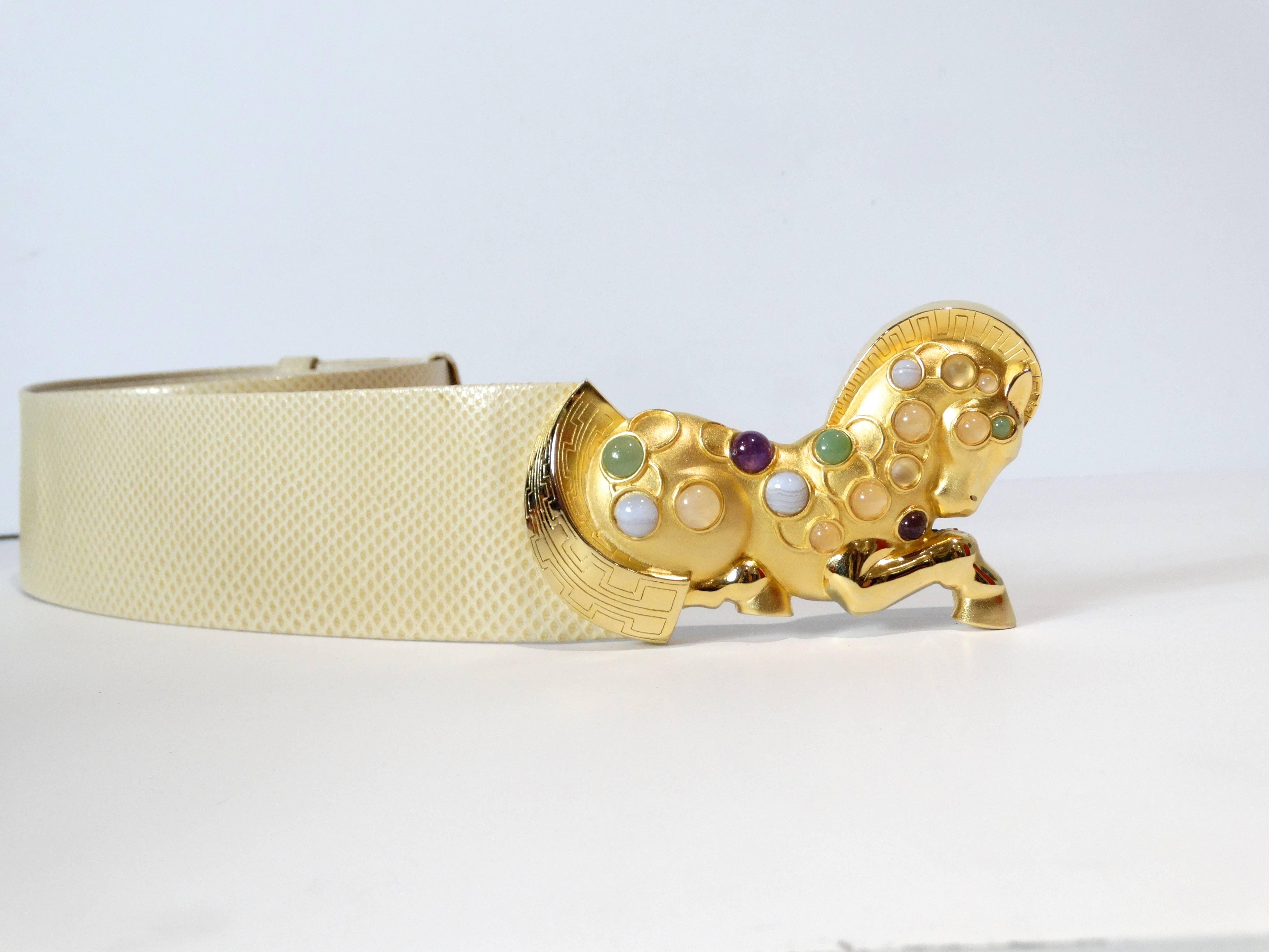 1980's Judith Leiber Golden Trojan Horse Buckle is embellished with lovely cabochon stones of Amethyst, Jade, White Marble Horse features polished and matte gold-tone metal. The horse's mane and tail are etched in an interpretation of a traditional