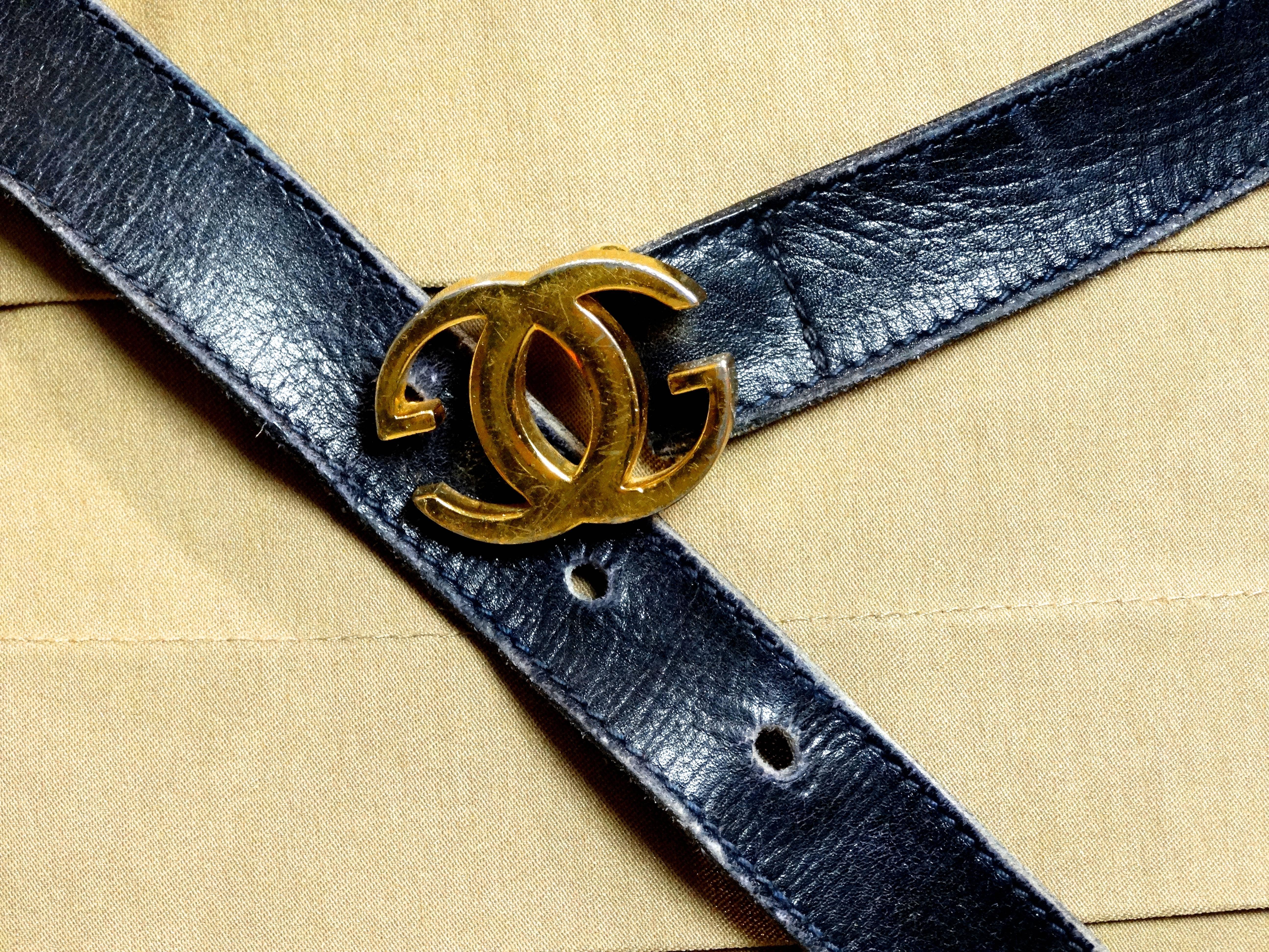 Classic Gucci navy blue leather belt from the 1970's featuring it's iconic 