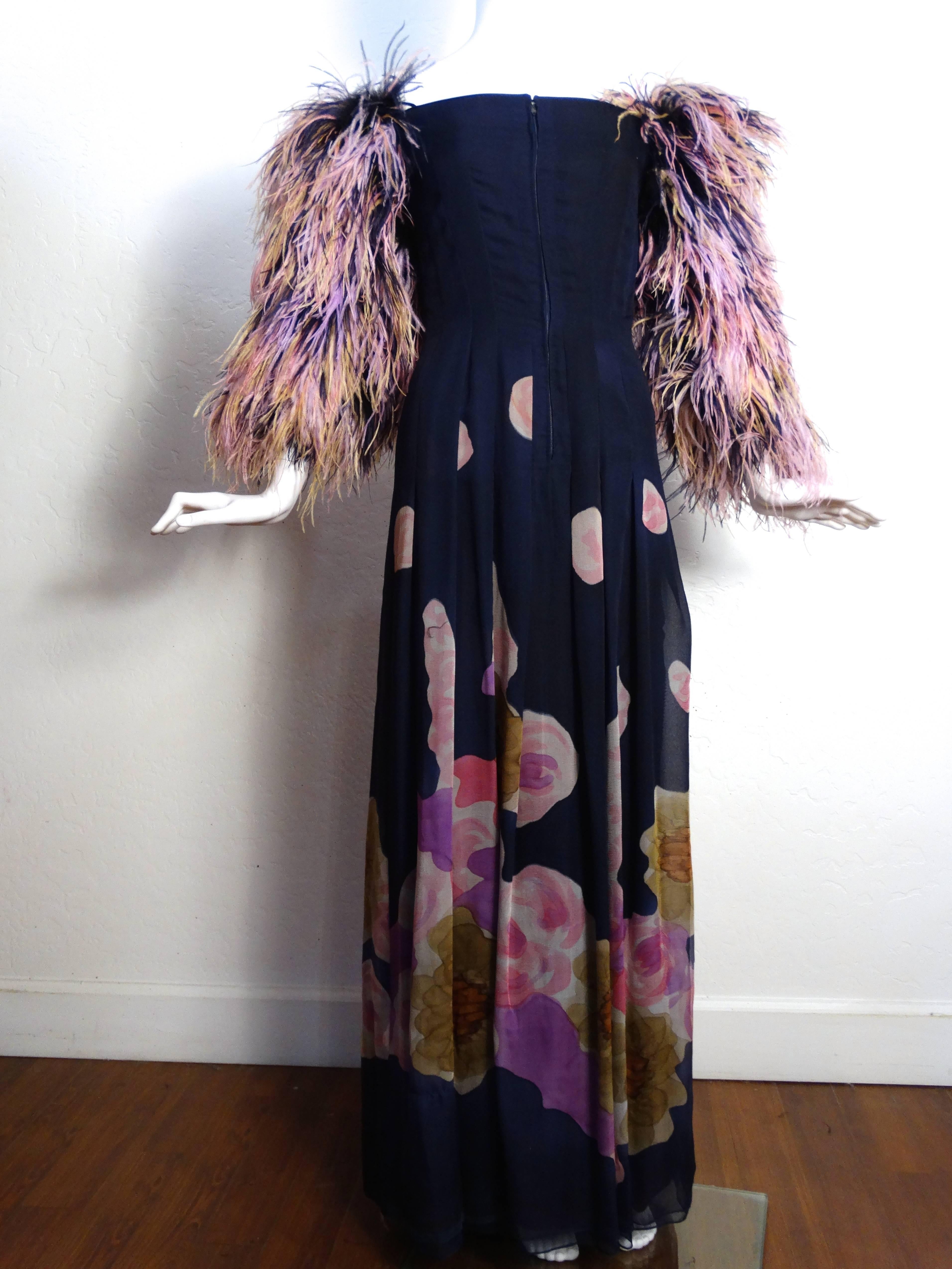 This beautiful 1980's Hanae Mori dress is to die for... all hand painted on silk with  a beautiful floral motif. Ostrich feather sleeves in lovely pinks, purples and creams. Sleeve is off the shoulder and features two thin straps that can be worn on