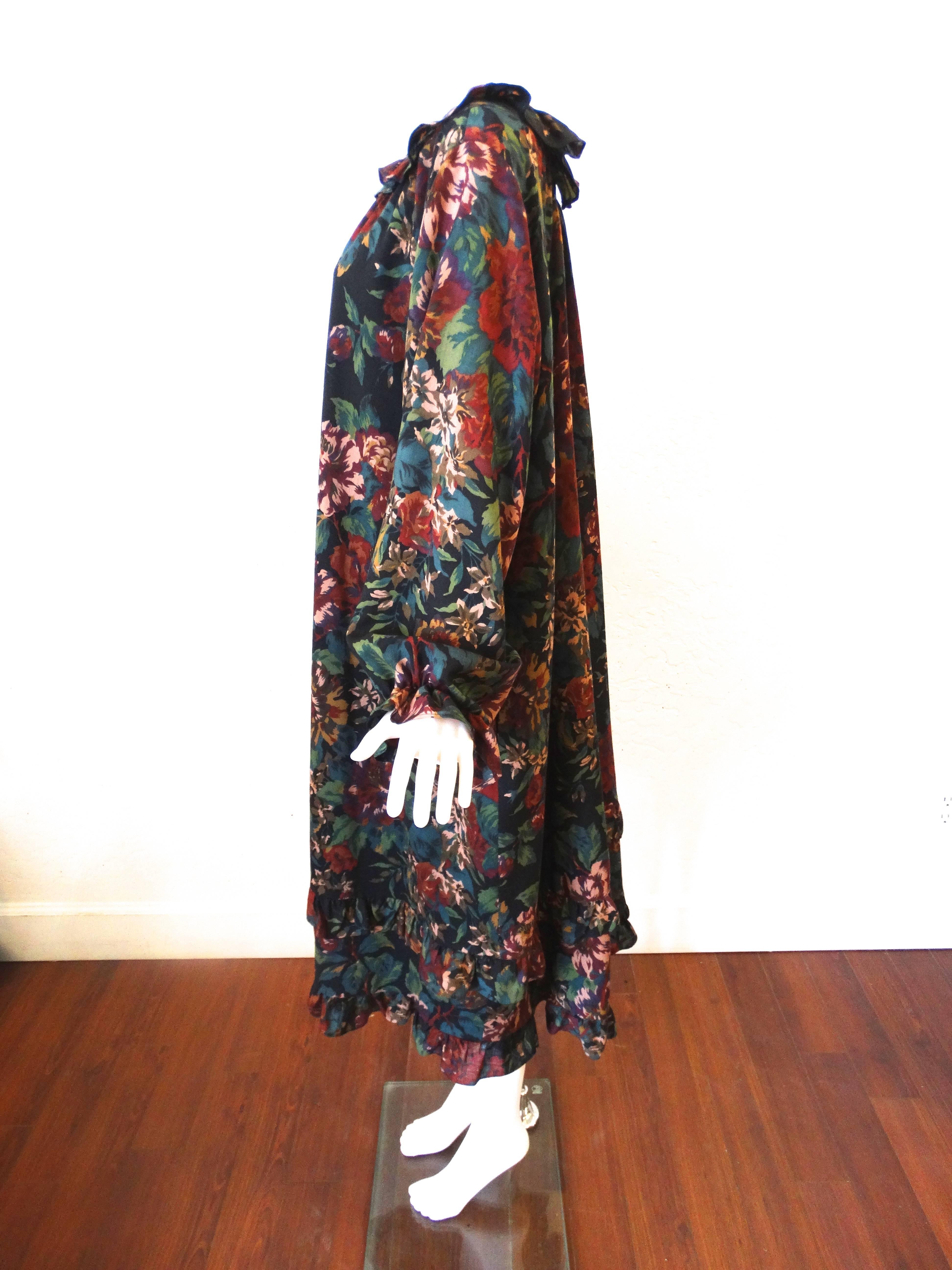 The perfect fall palette, this fabulous early 1990's Yves Saint Laurent floral dress is a dream. Oversized with a two-tier ruffle hem line. 9