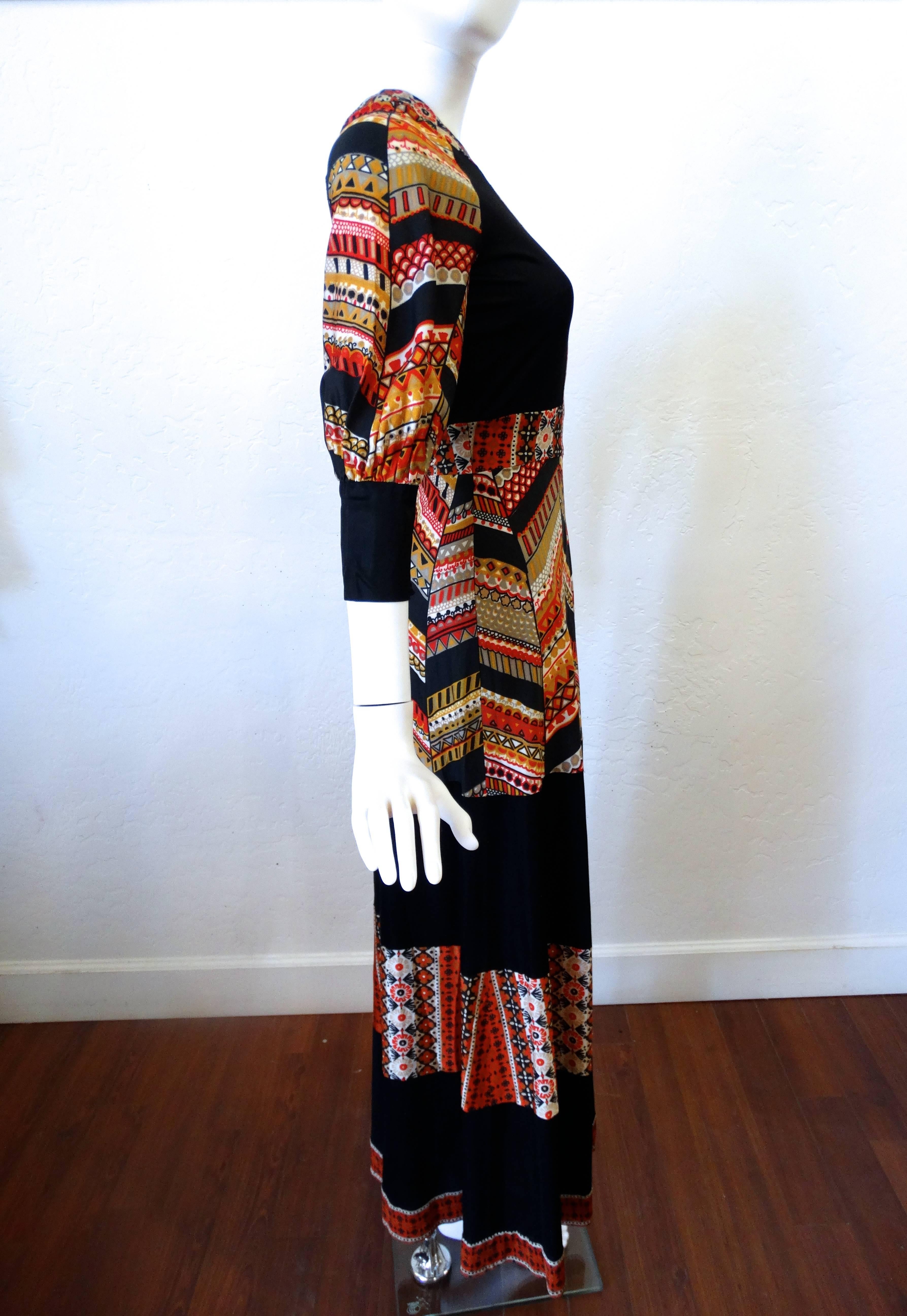 1970's Jean Varon southwest print maxi dress with native trim at the collar and hem. Great color way for fall and winter.  Fits an xxs to a small, In excellent condition

Measurments: 
Underarm 2 Underarm Doubled 32 inches
Waistline 24