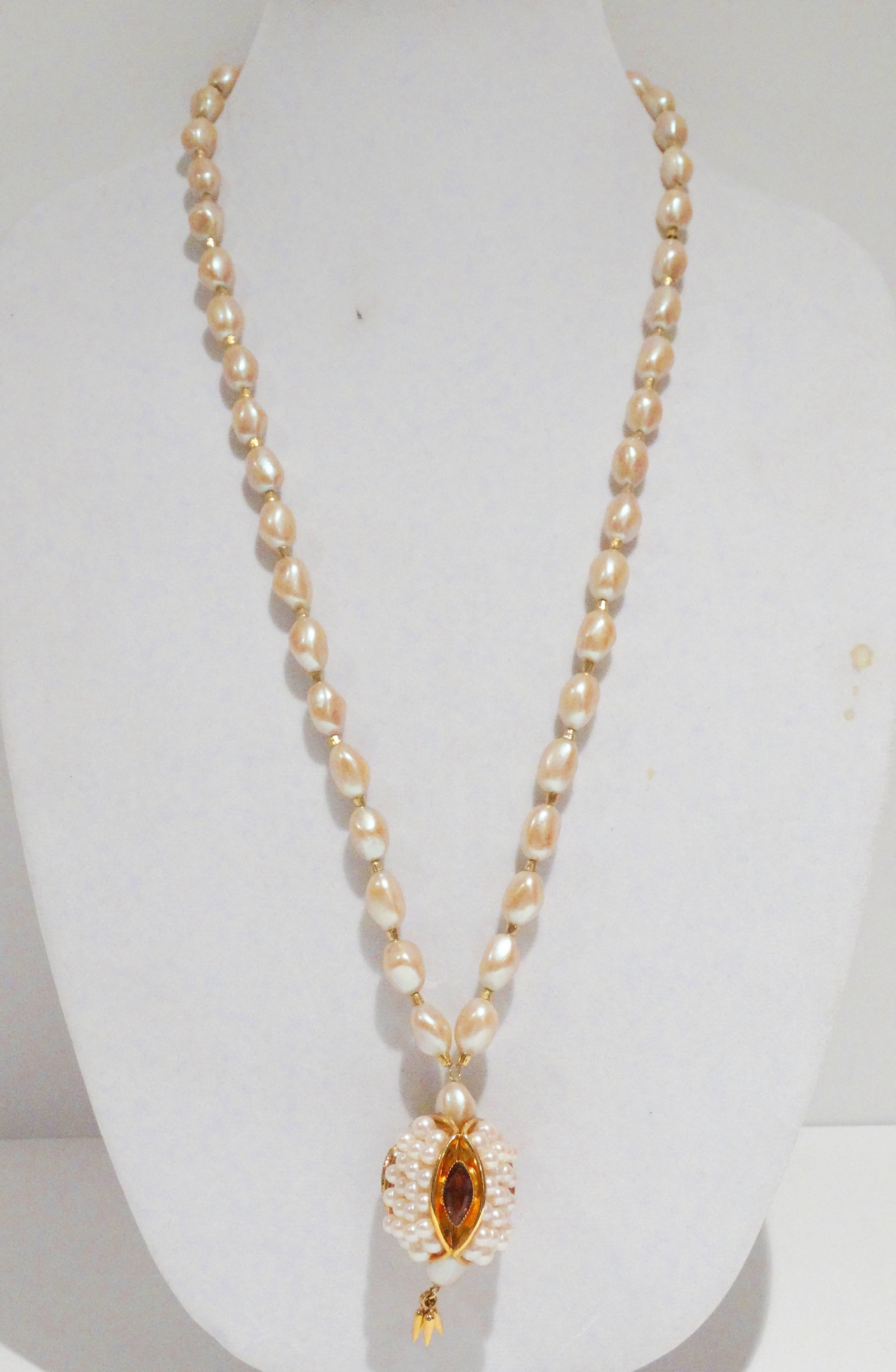 Fabulous 1970's Pearl deLillo necklace with a 3-D snake like head pendent. 3 large cat eye amyethest stones on pendent, pendent is in crusted with pearls. Necklace drops down 17