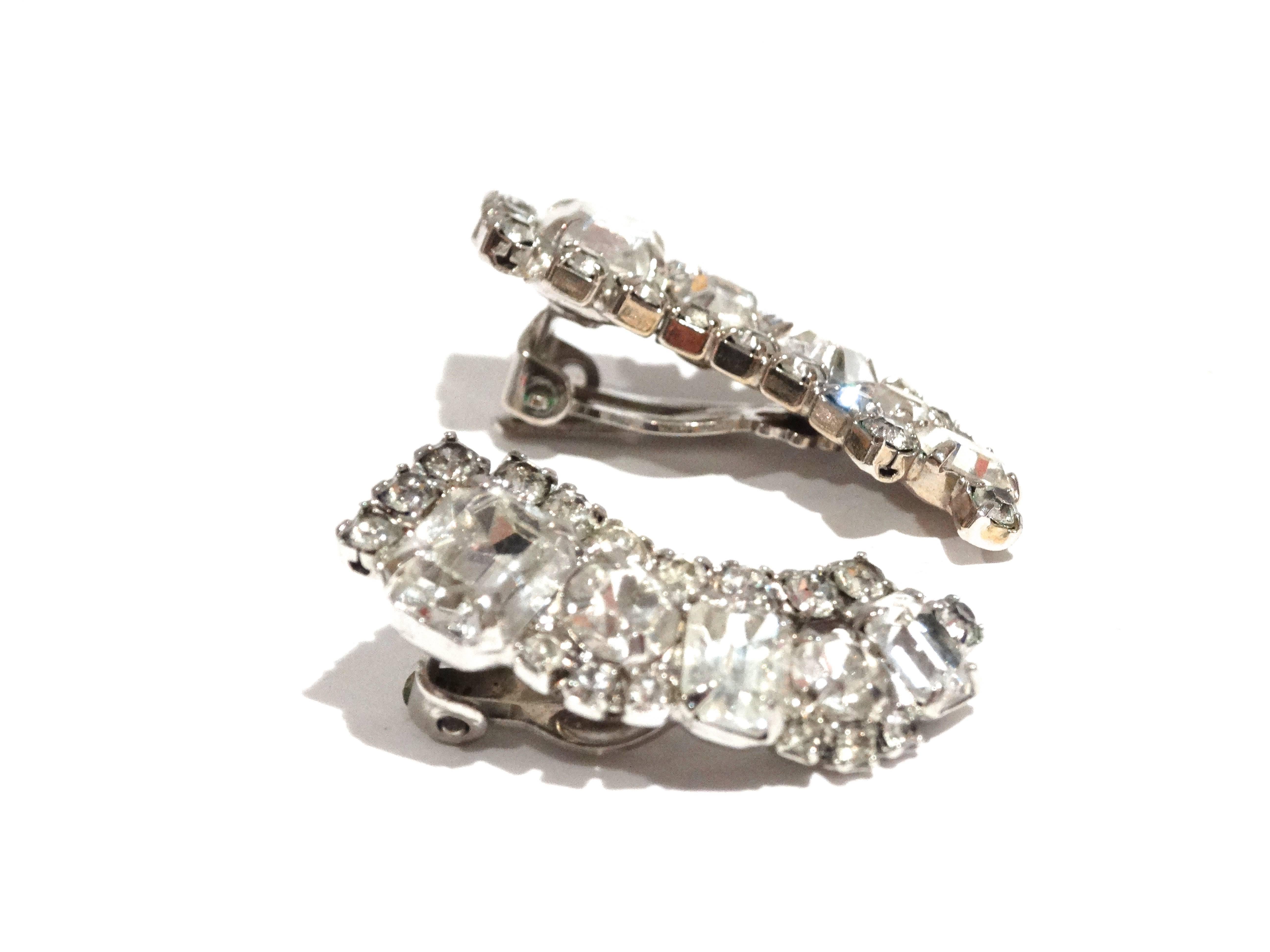 Gorgeous Signed Weiss Rhinestone Earrings which climb up the earlobe. Featuring emerald cut stones in an Art Deco style. Clip On Clip Earrings w/Clear Rhinestones. Weiss is one of the premier costume jewelry makers. All the stones are of supreme