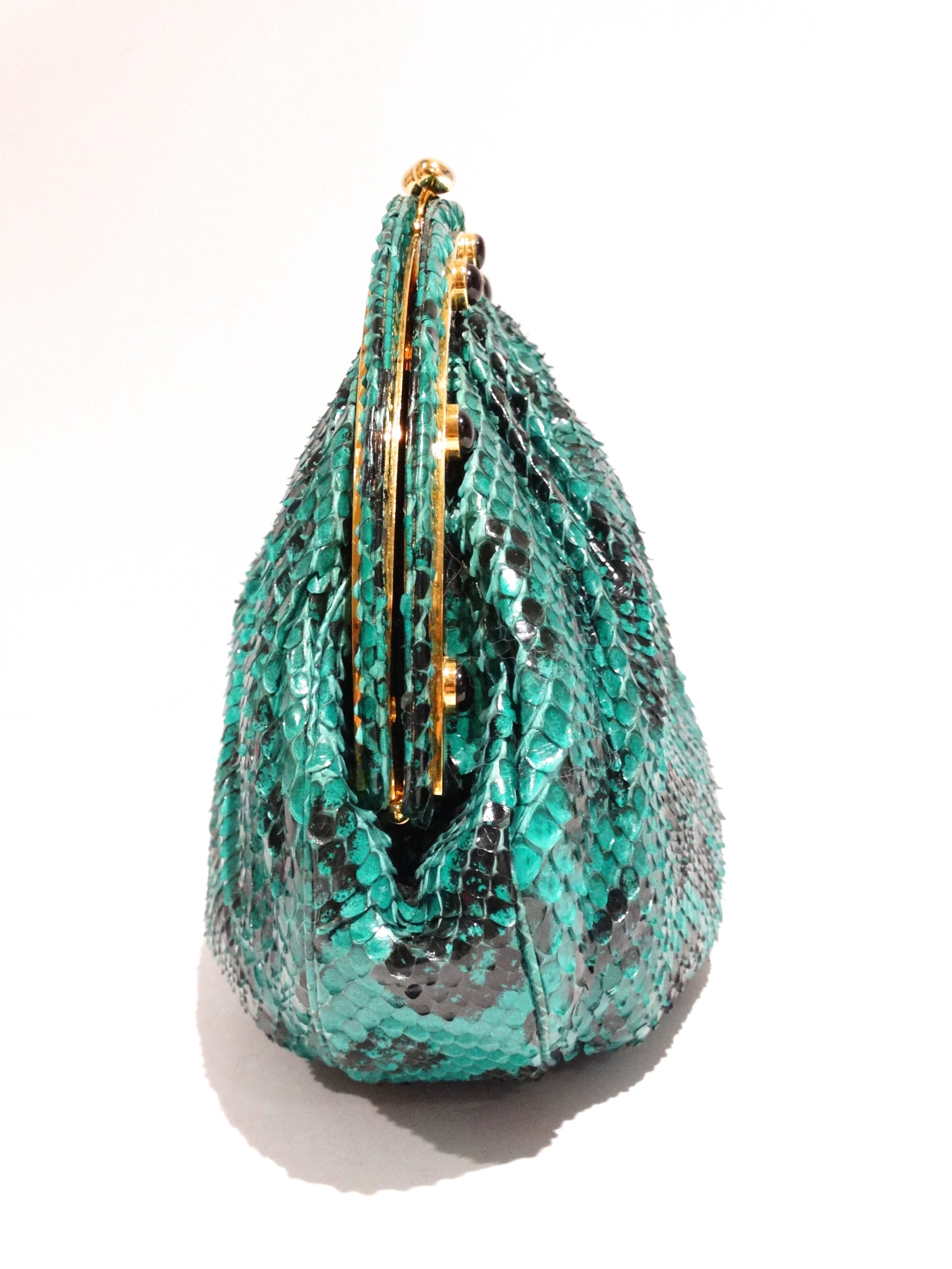 Hello Emerald Gem.. this is an Amazing 1980's Judith Leiber for Neiman Marcus snakeskin bag in emerald green with a black leopard print! It's a show stopper, a truly  piece of art! The frame of this bag is very rare and uniquely embellished with