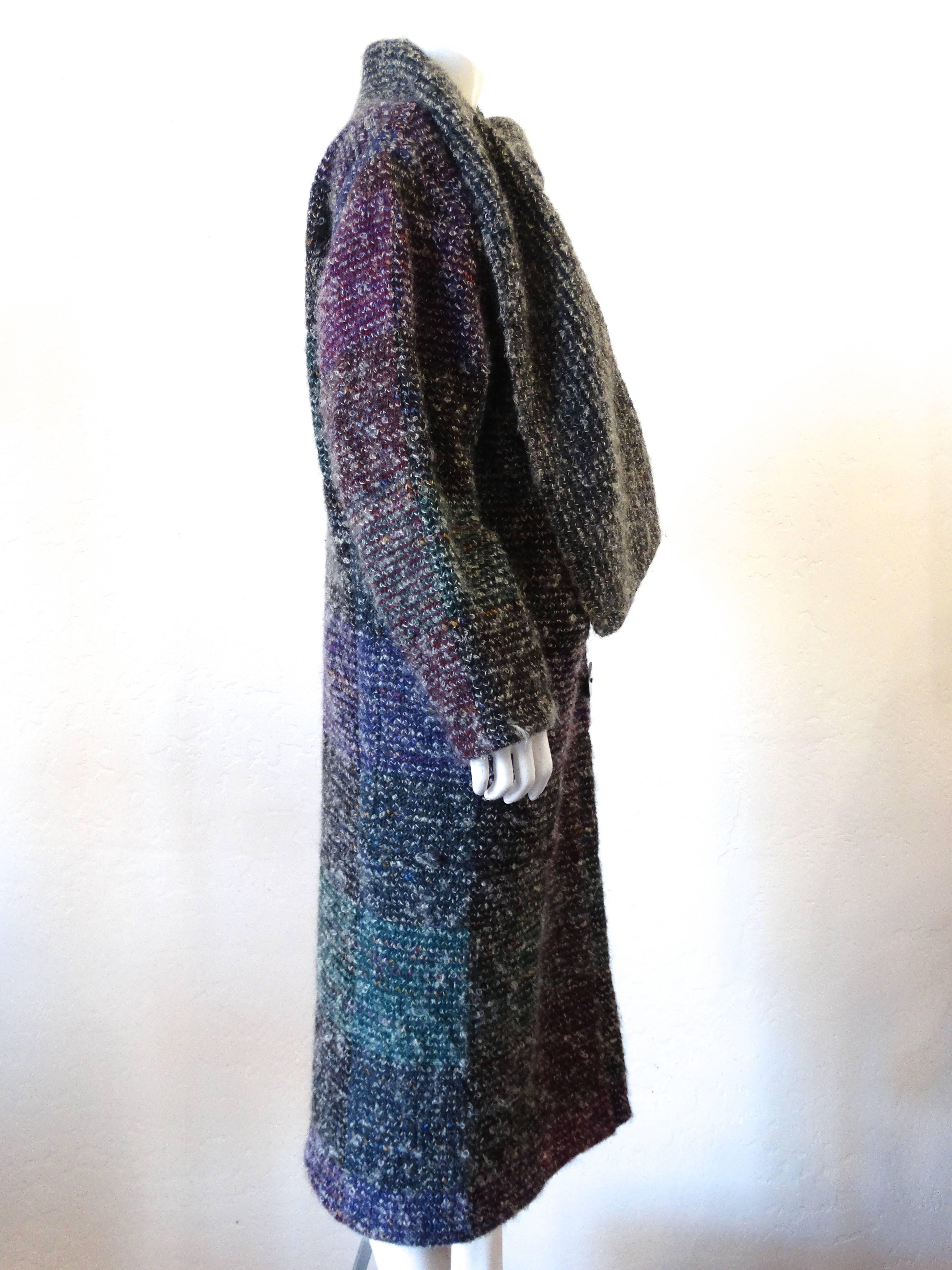 From one of my favorites this beautiful 1980's Missoni multi-coloured  mohair and wool knitted checker coat print from Missoni screams 80's chic. Featuring a foldover neck, an off-centre front button fastening, long sleeves, a long length and a