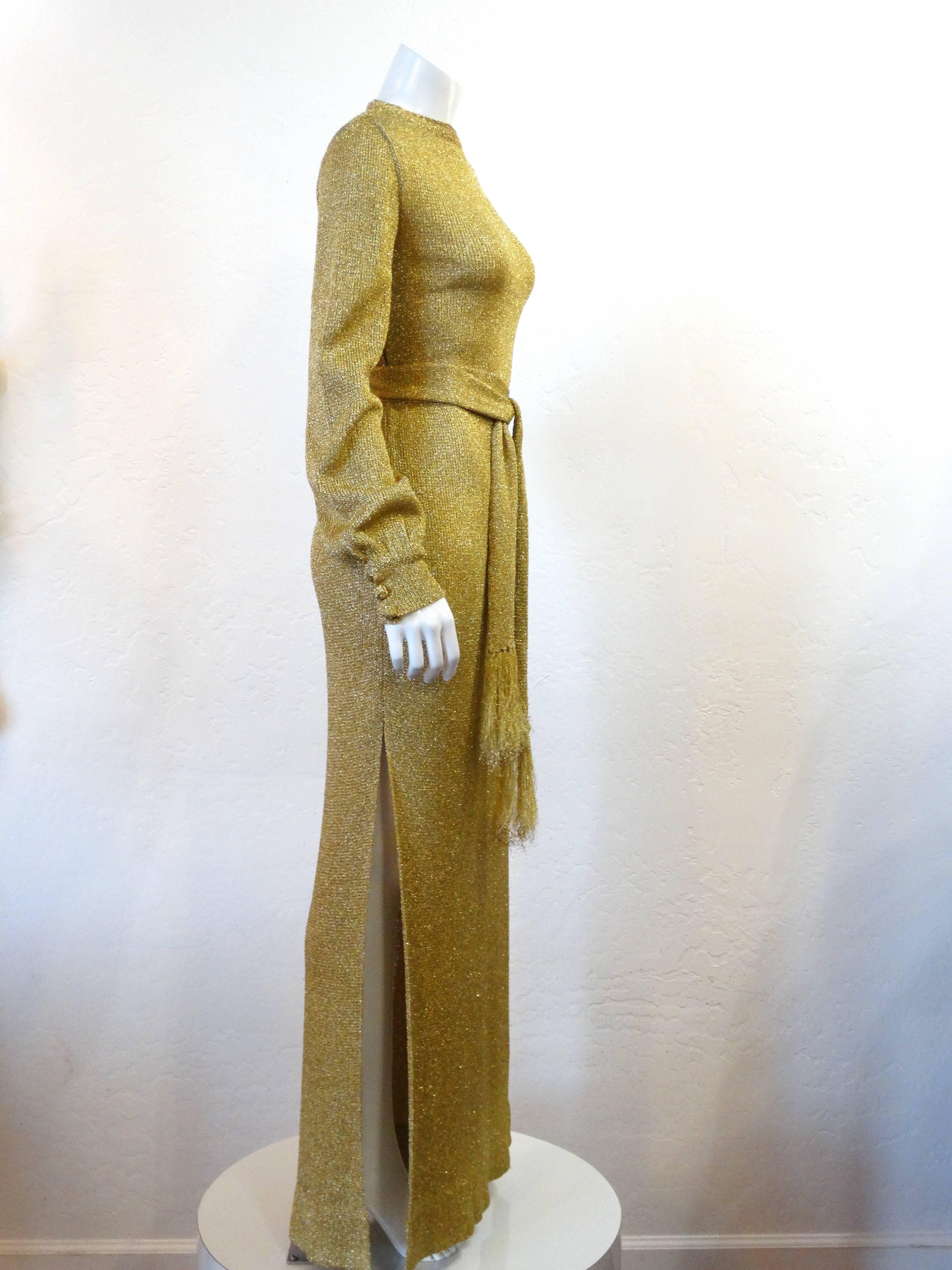 Simply stunning this beautiful 1970s super model length gold metallic gown with open back and side splits on both sides. Button back closure, Tag states 