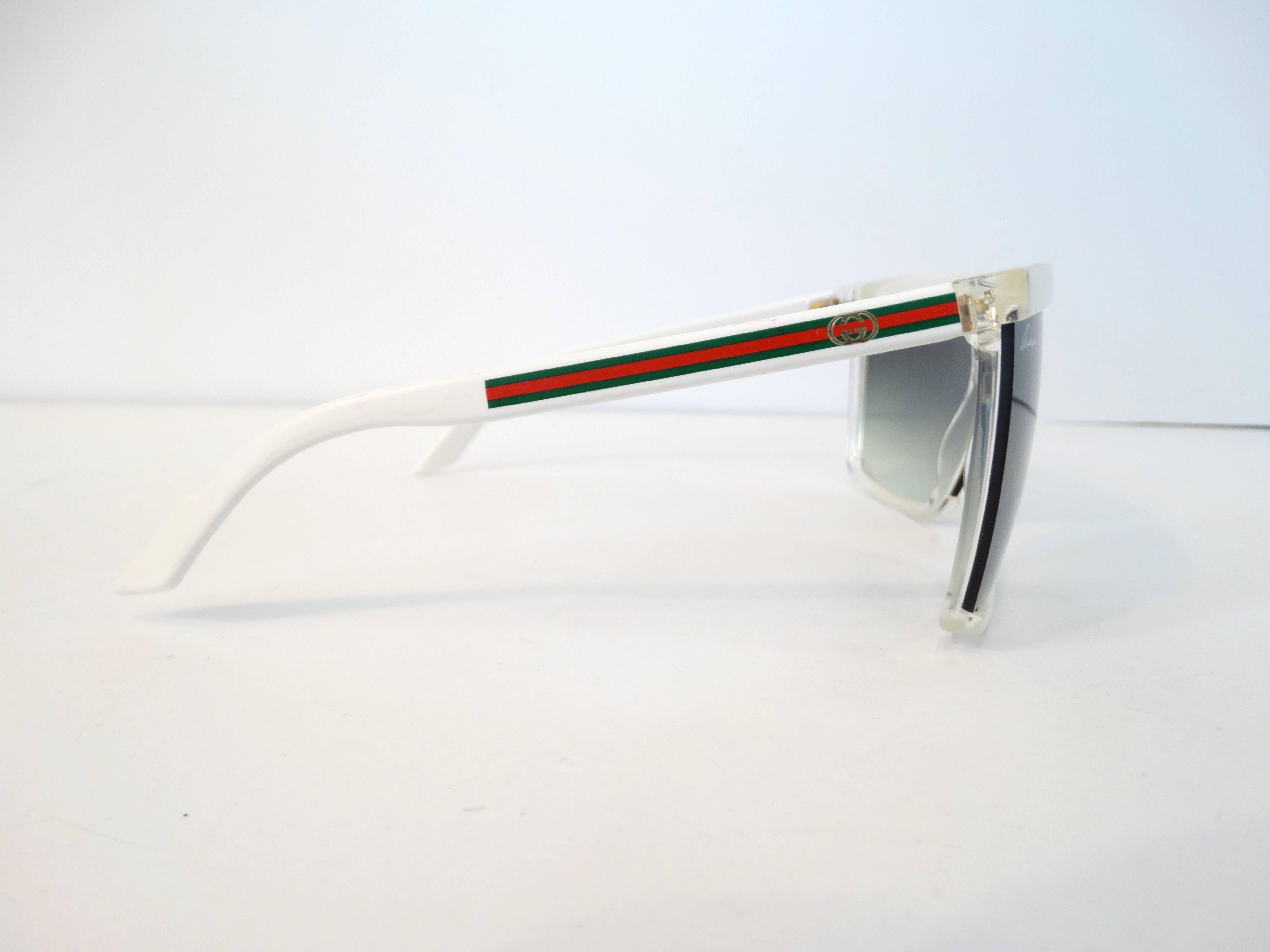 These fabulous Retro inspired Gucci sunglasses in bright white are made from a natural material that is derived from ricinus, the castor-oil plant – highlighted by eye-catching colour combinations in shades of red, white, green as well as iconic