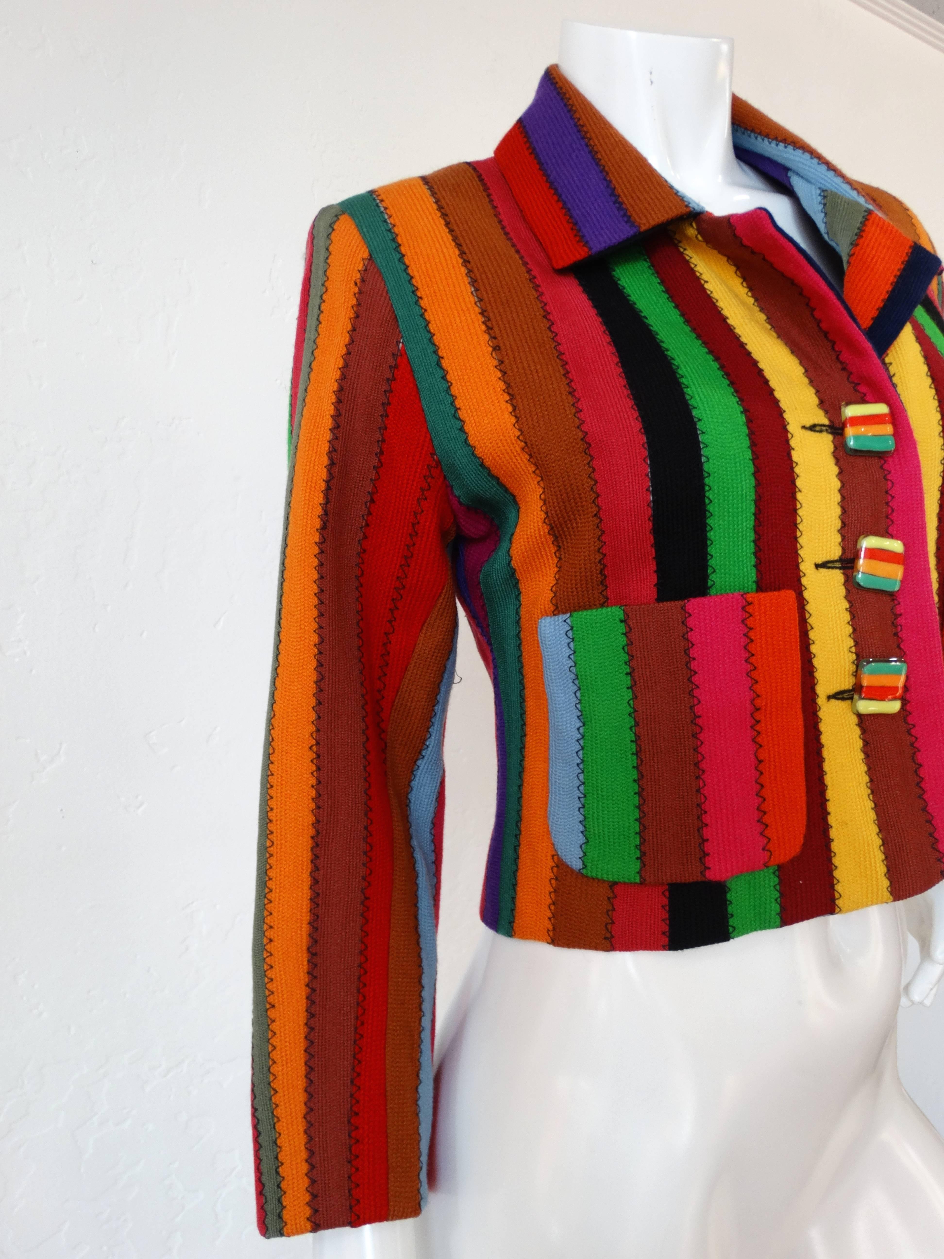 For the lover of stripes this Todd Oldham 1990's Jacket is for you! Buttons up the front with square hand blown glass buttons. Striped cropped blazer/jacket with two front pockets and fully lined. Made in the USA this jacket is a size 4 bust 34