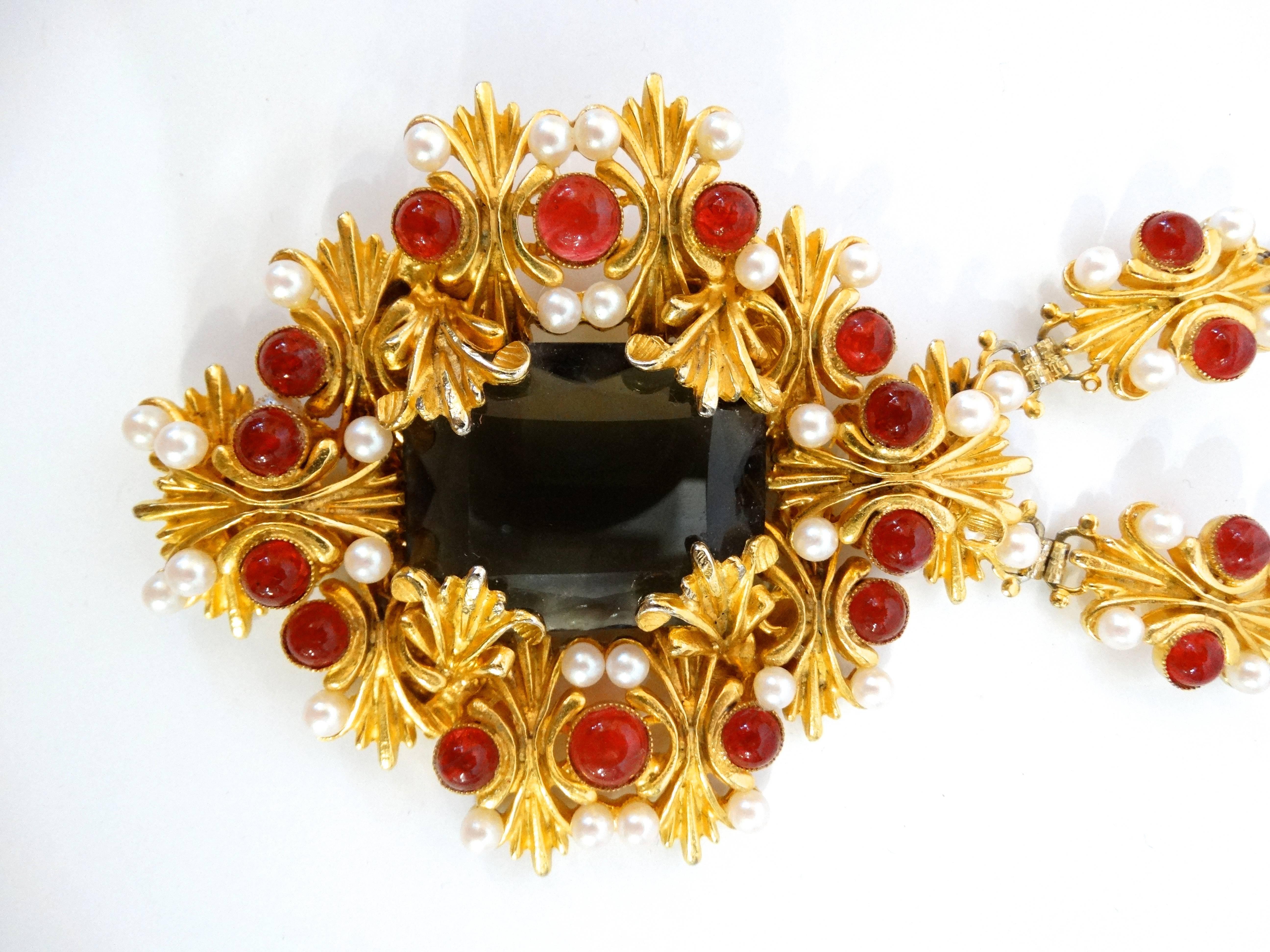 This a beautiful one of kind 1960's William de Lillo Royals necklace. This beauty features a large black Topaz with Red Cameo Glass cabochons stones through out and pearls. Signed de Lillo 
Pendent is large in scale  5 ' inches by 5' inches.