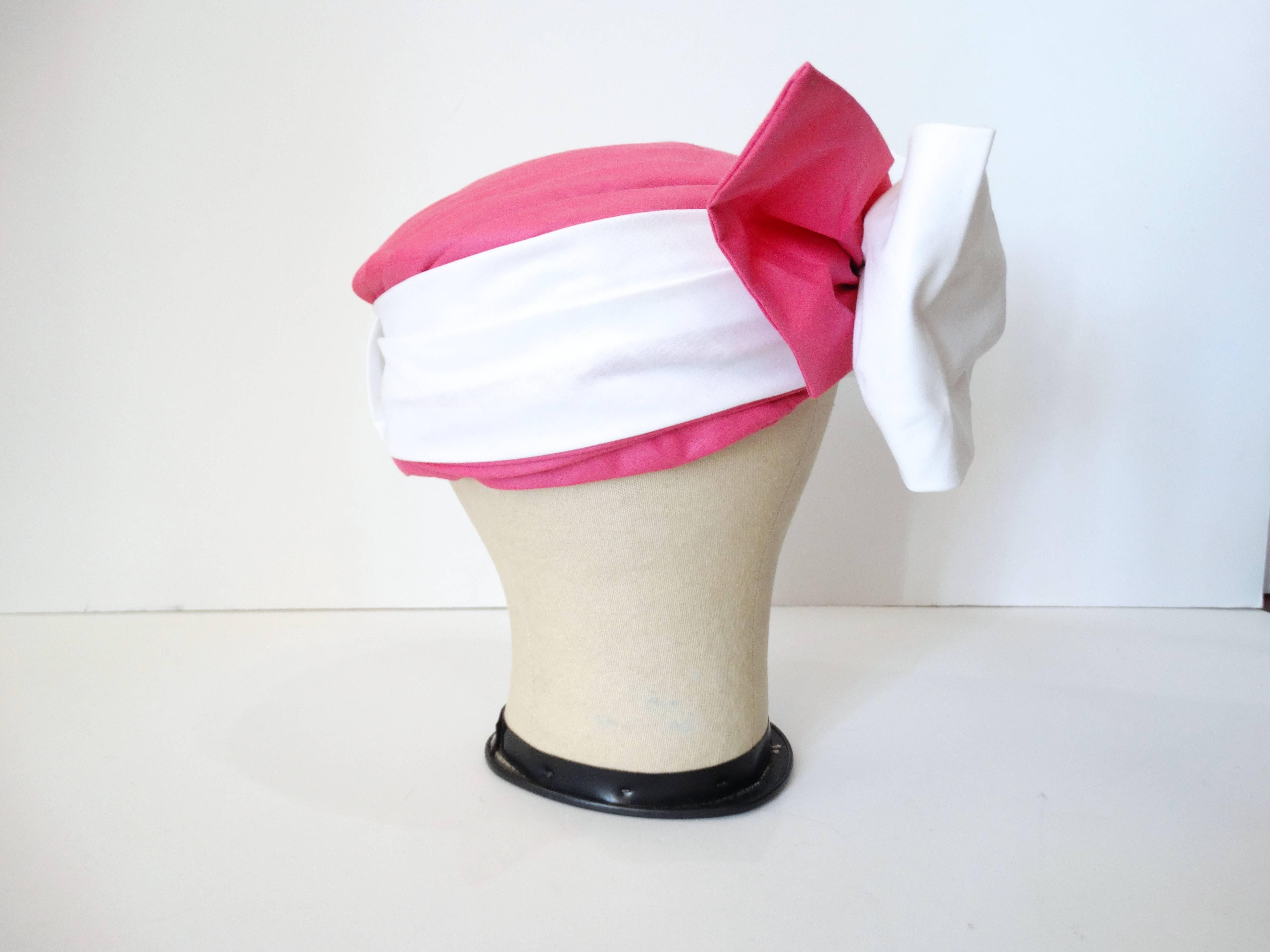 Sweet Yves Saint Laurent Rare vintage Turban style hat with large bow. I believe silk or a cotton blend, this hat is lightweight and the inside is lined with netting. measures approx. 21