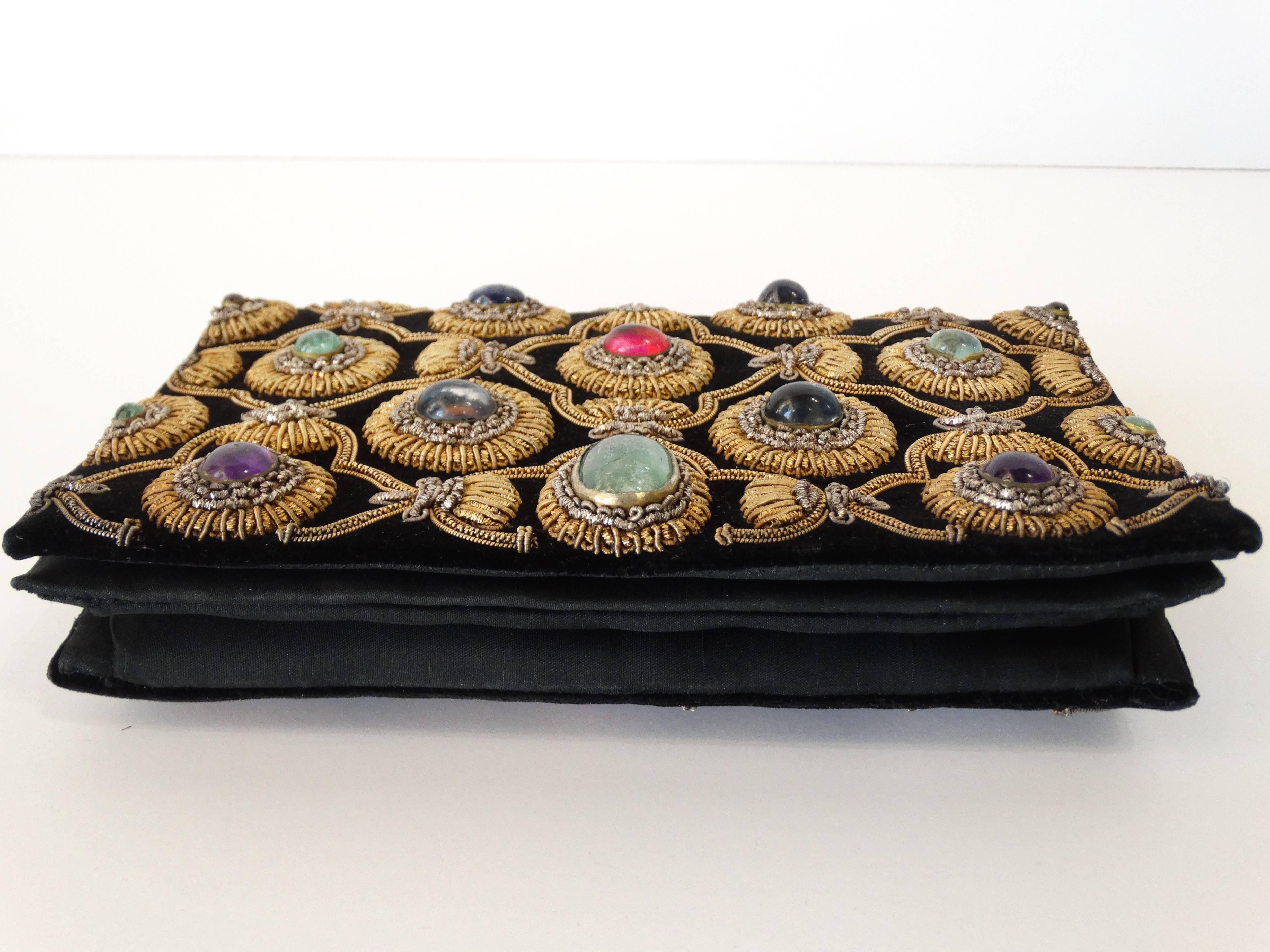 Beautiful 1960's Zardozi Zari gem-set evening handbag attributed to Van Cleef & Arpels from the 1920s The gold textile rectangular bag, embroidered with a quatrefoil lattice design in gold and silver metallic thread, set with amethyst, jade, onyx