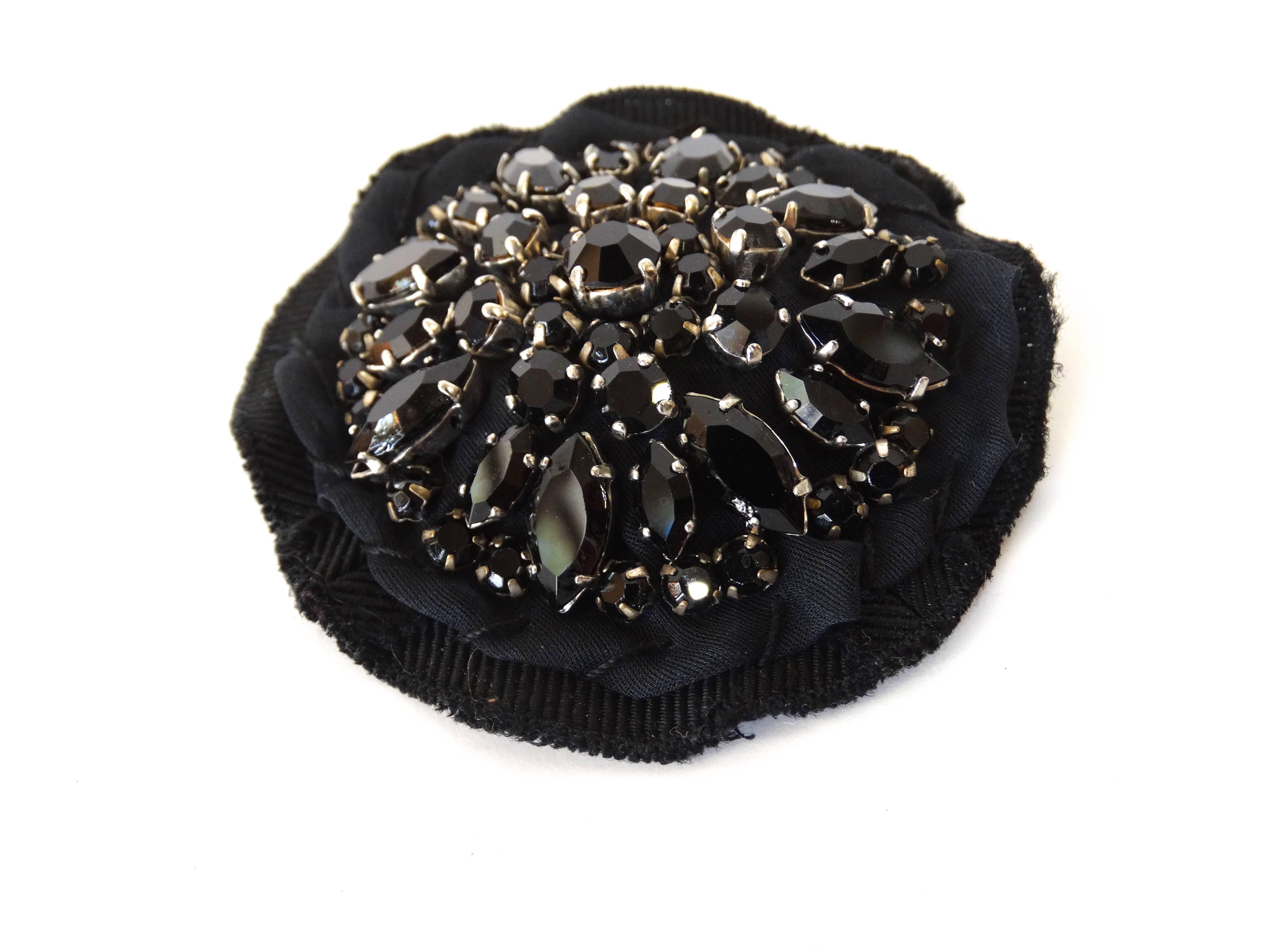 Incredible Prada Jewel Brooch! Black rhinestones arranged in a floral medallion on layers of woven black cotton. Measures 3& quot; across. Prada label atttached. 