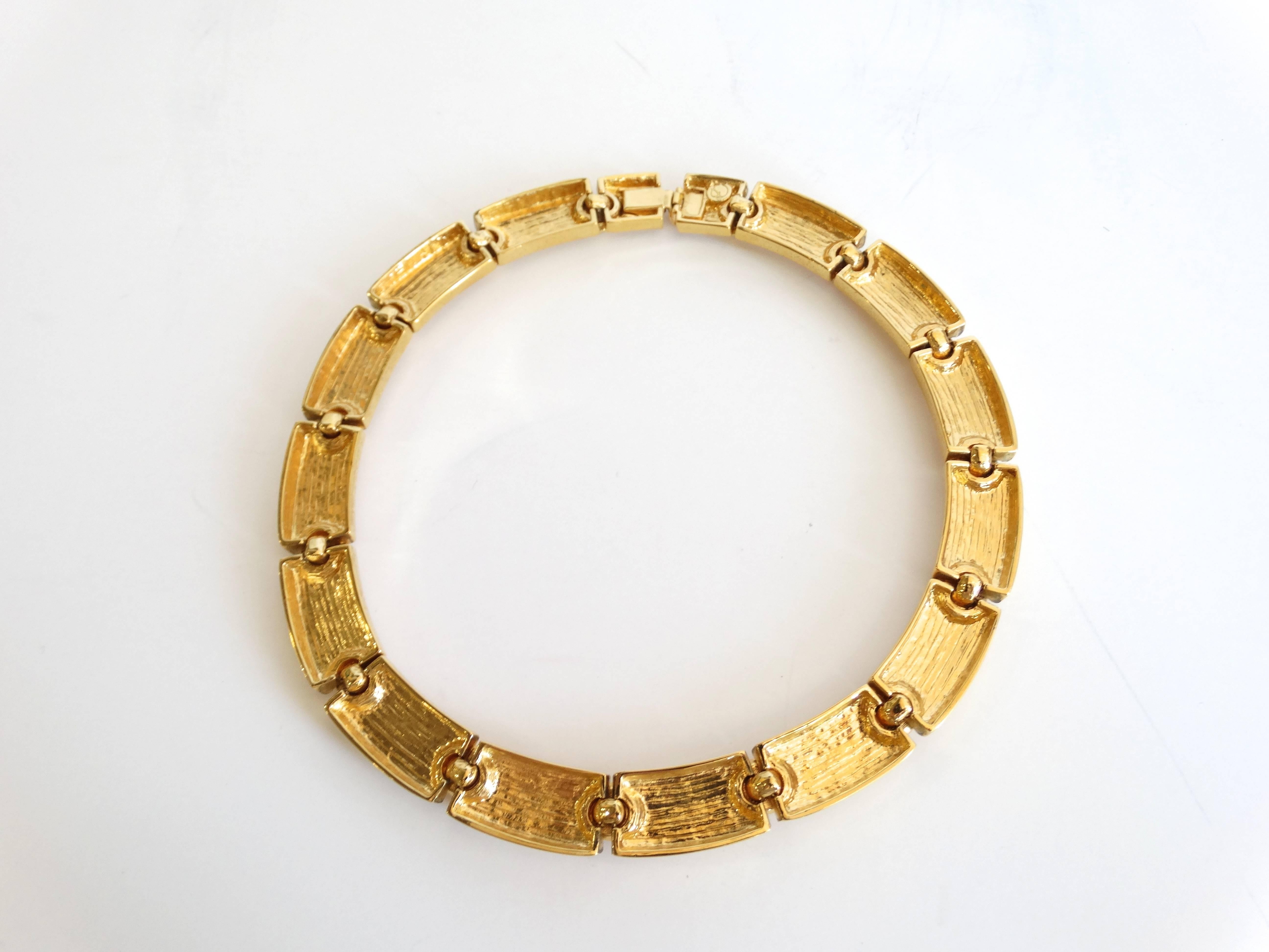 1980s St. John link collar necklace in gold! Chunky chain design with screw-like motifs, reminiscent of Cartier love jewelry. Box clasp closure. Signed with
St.Johns watermark. 16