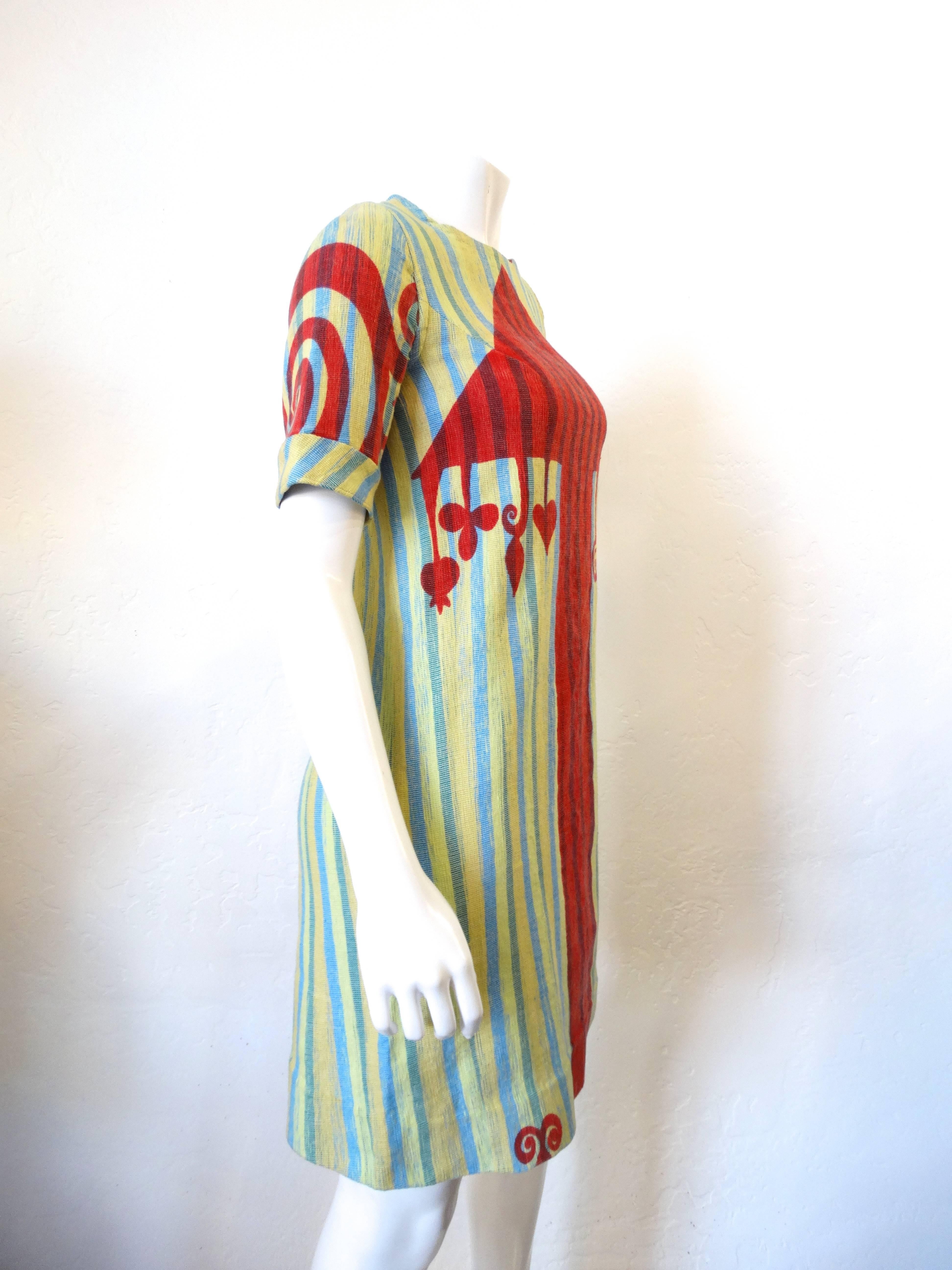 The most incredible 1970s Rikma by Rosi Ben Yosef mini dress! Made of thick, quality woven cotton with multicolored stripe pattern and red arrow graphic up the front. Short sleeves with a mini fit- zips up the back for easy on and off! Fits a size